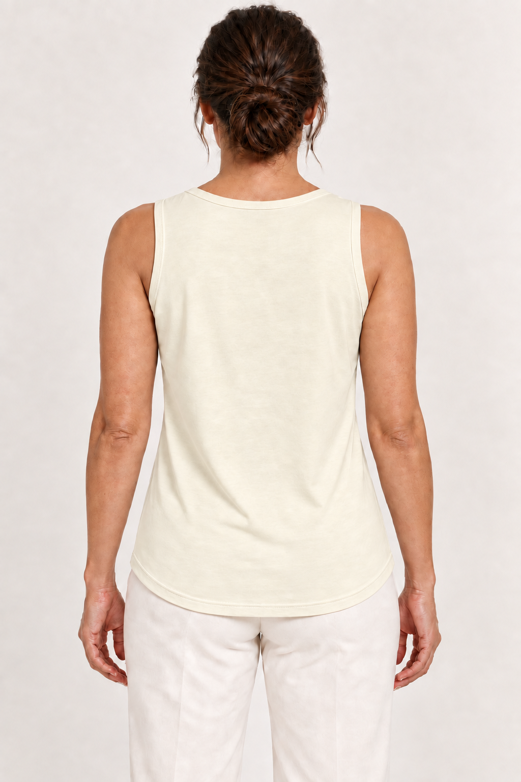 Beige cotton-stretch round-neck tank, model back.