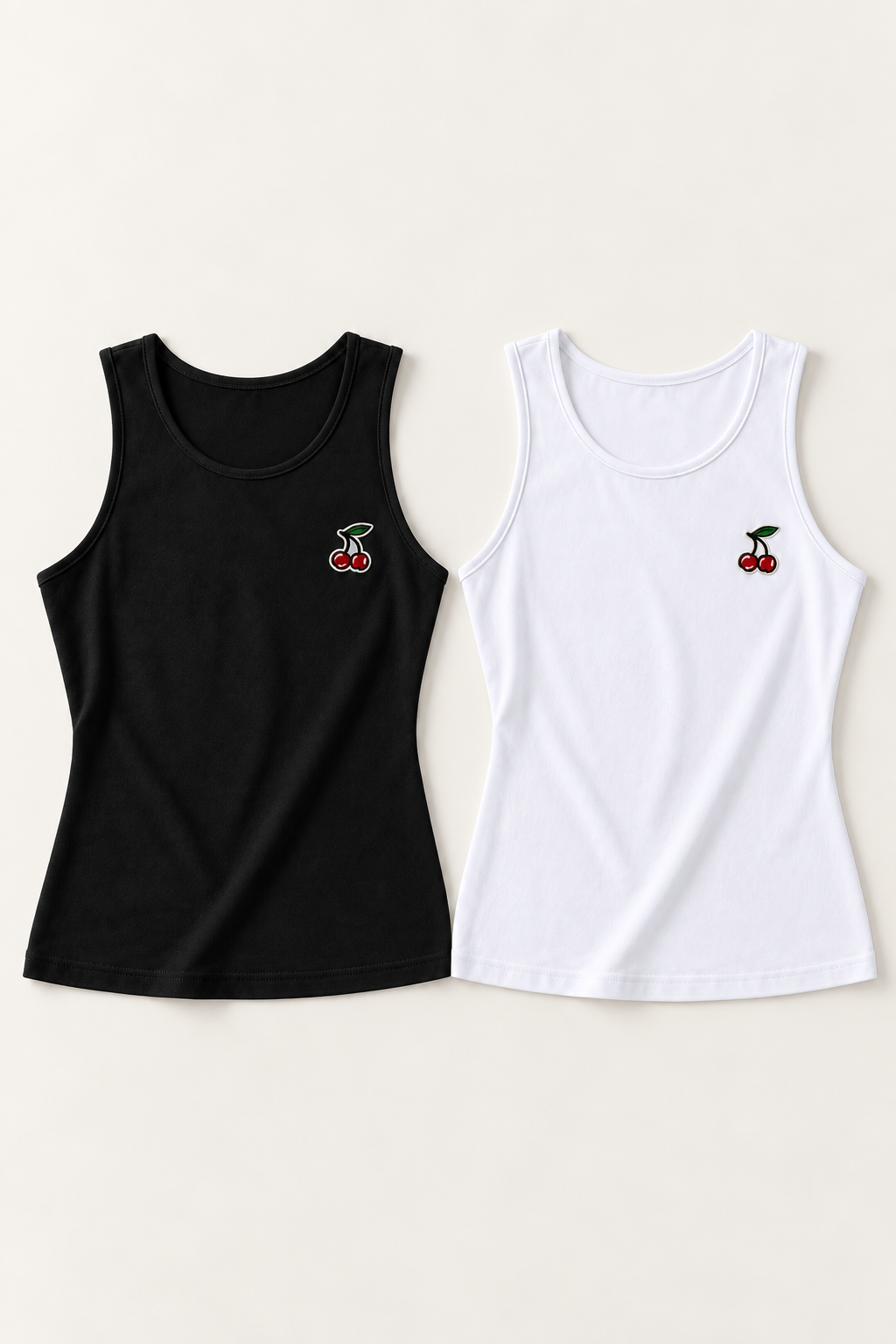Two cotton-stretch tank tops in black and white with cherry embroidery, front view