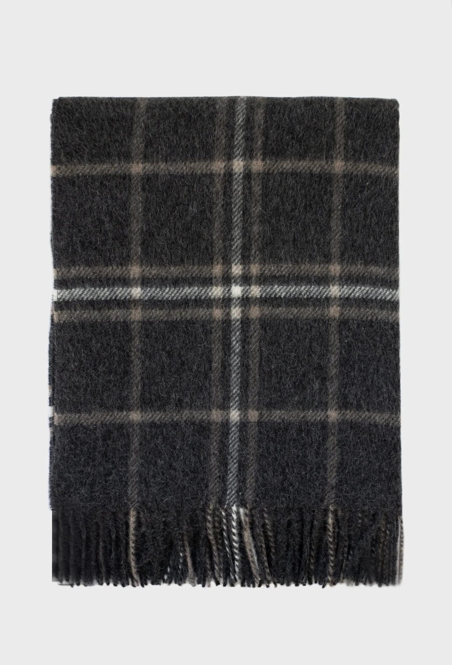 Folded Kingston Alpaca Blanket in dark plaid pattern, showcasing soft alpaca and lambswool blend for all-season warmth and comfort.