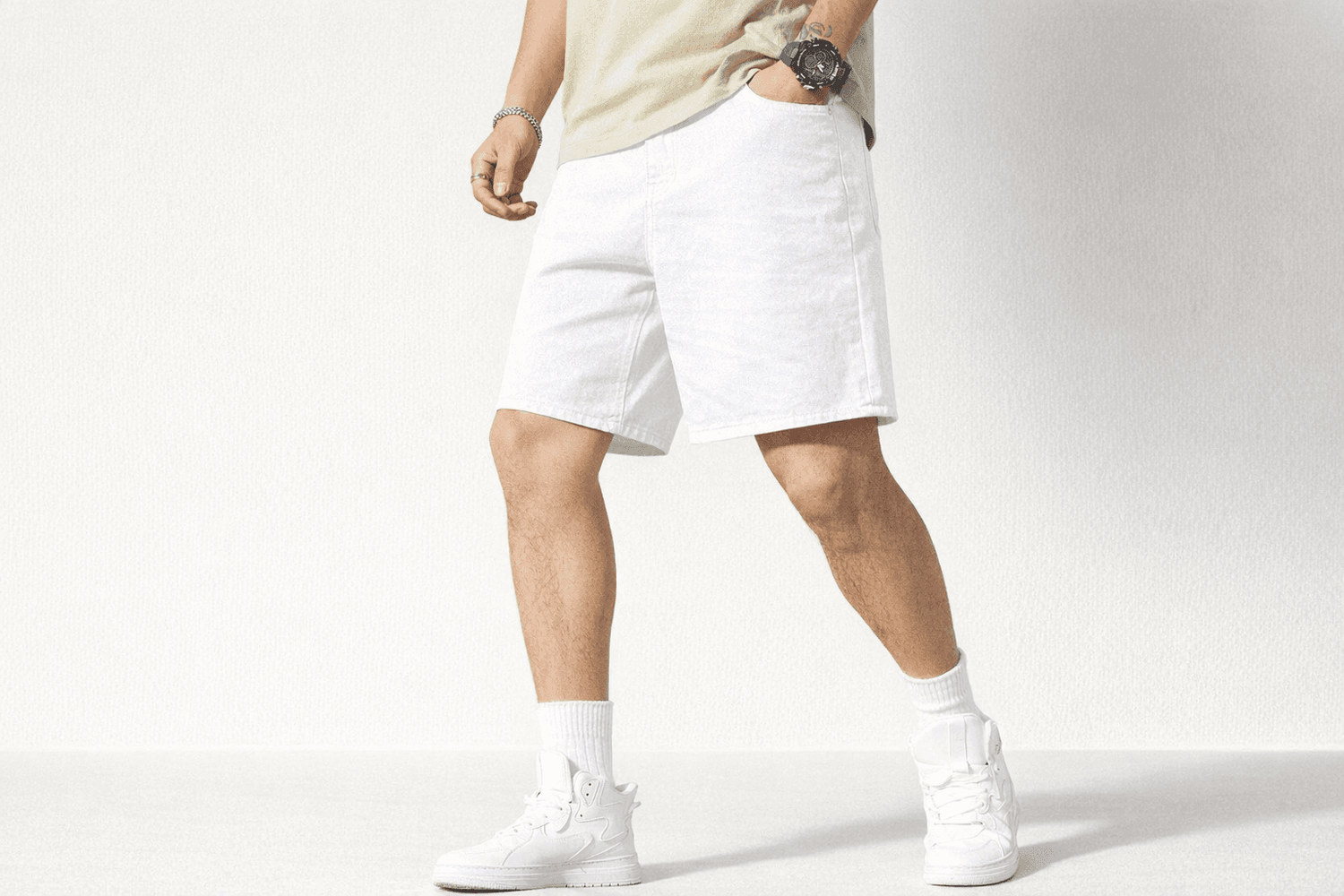 Essential Denim Shorts in Cream and White in White shorts foundation on-model front angled with refined IdyllVie styling