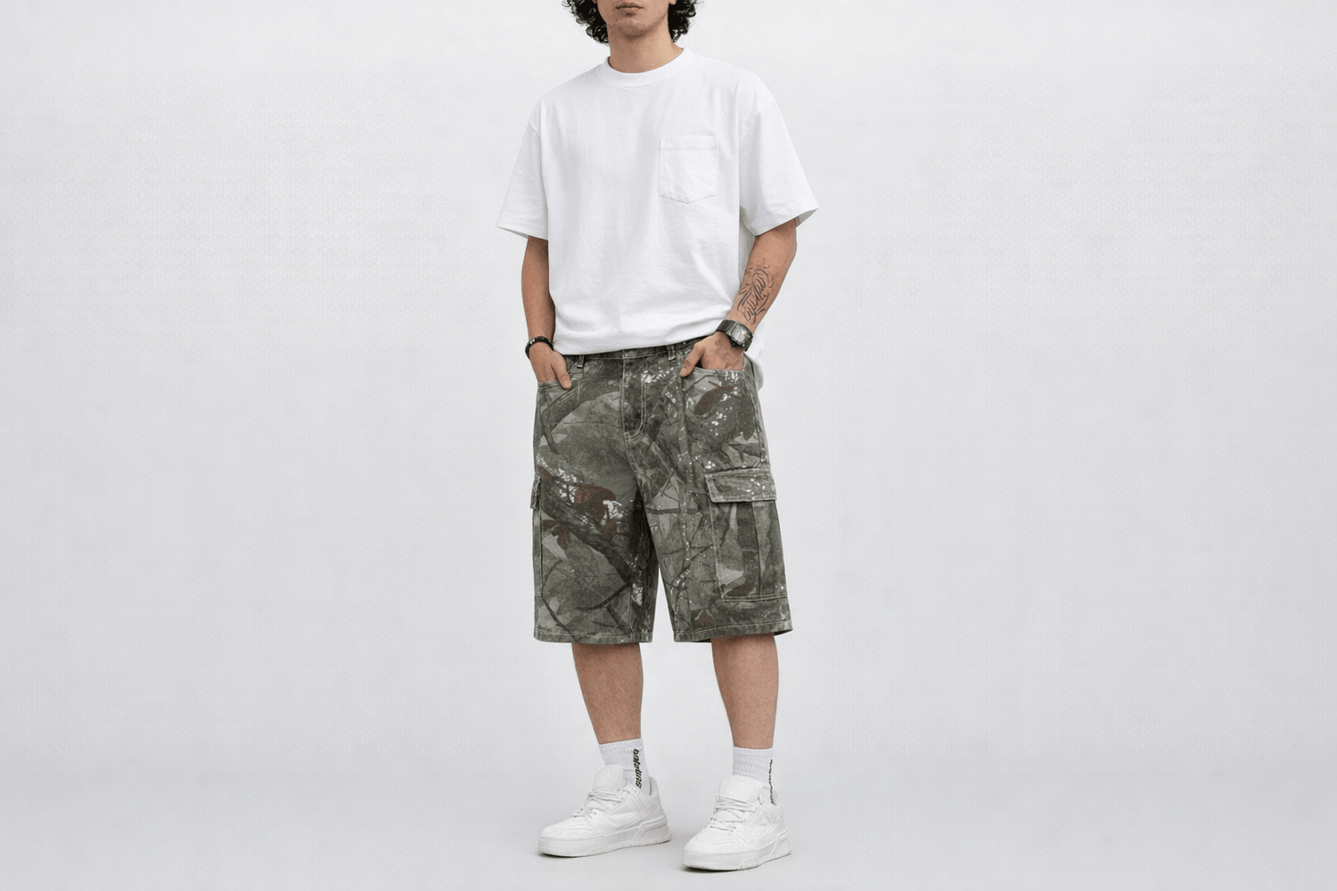 IdyllVie Green Camo Baggy Jorts in Camo shorts foundation on-model front full with refined IdyllVie styling