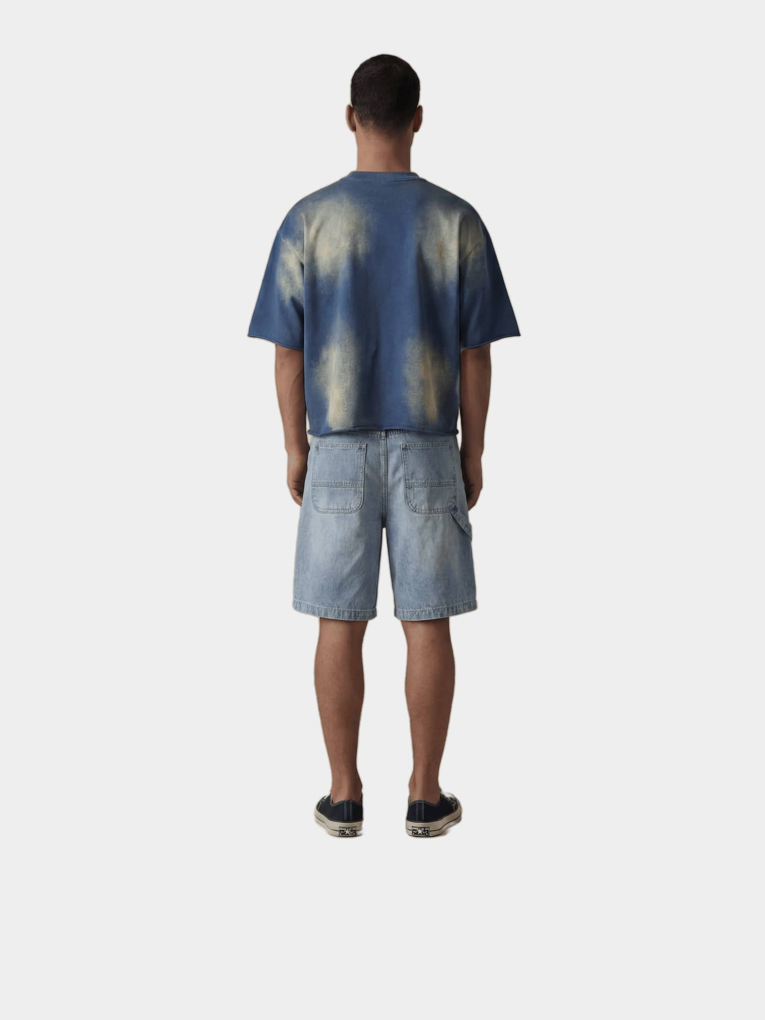 Stonewashed Denim Bermuda Shorts in stonewashed cotton, lifestyle view showing front pockets