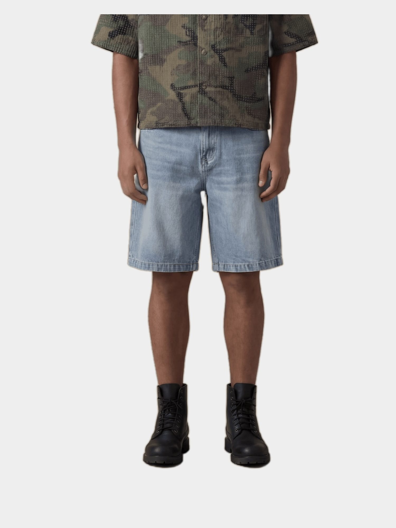 Stonewashed Denim Bermuda Shorts in stonewashed cotton, lifestyle view showing front pockets