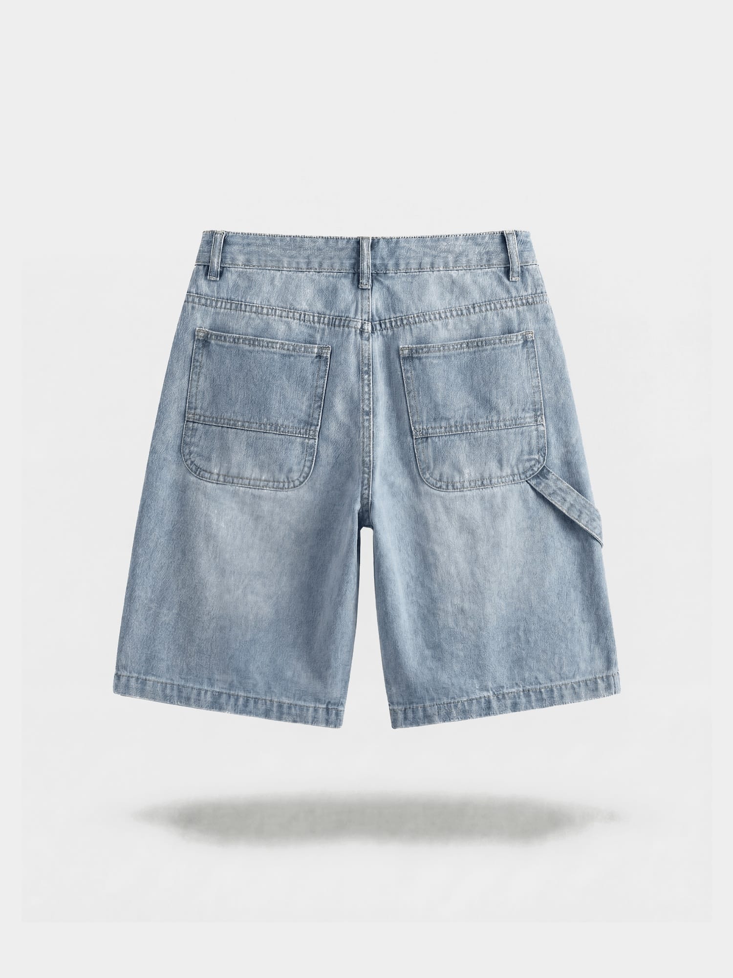 Stonewashed Denim Bermuda Shorts in stonewashed cotton, lifestyle view showing front pockets
