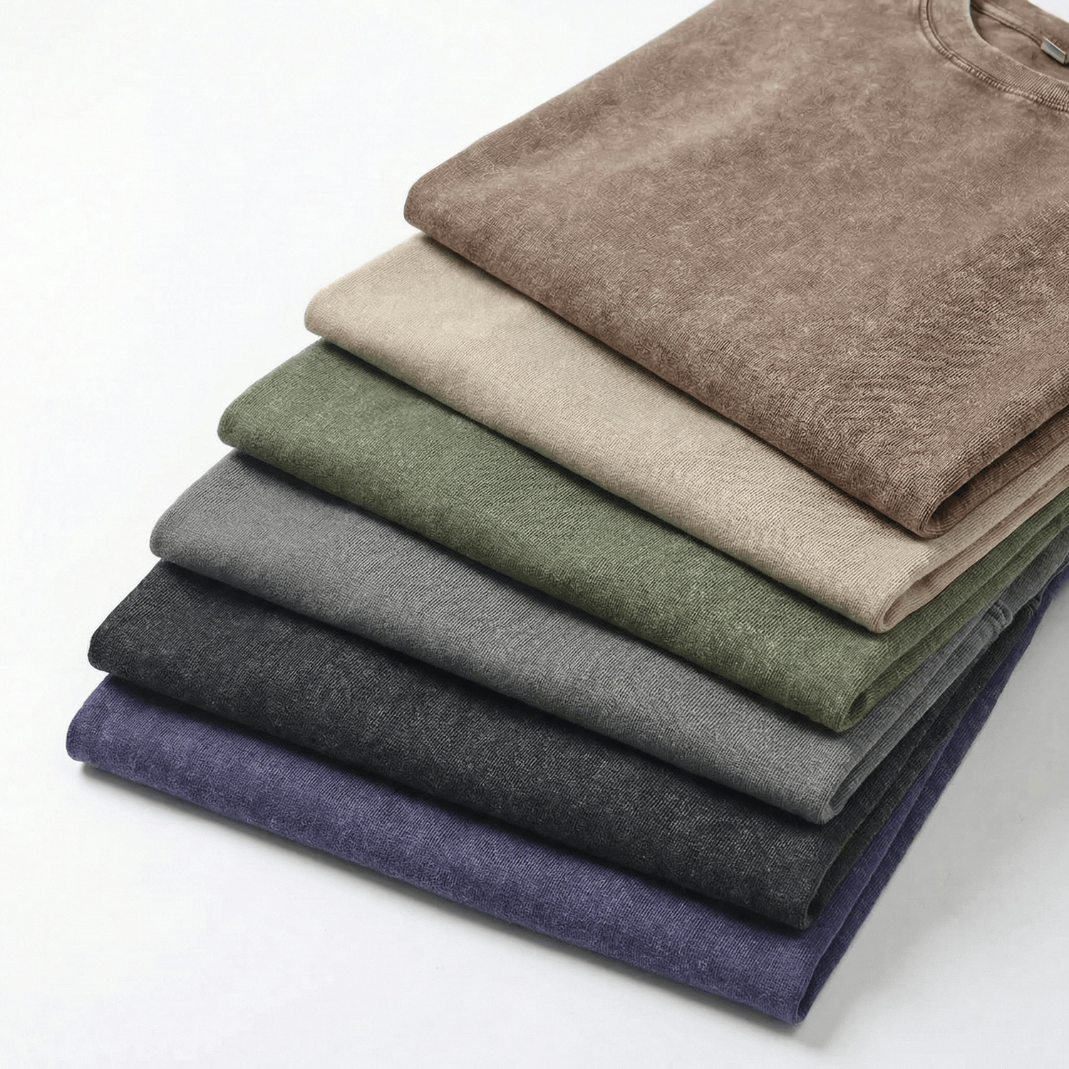 Stack of multicolored casual pants, versatile fabric, neutral tones, comfortable clothing