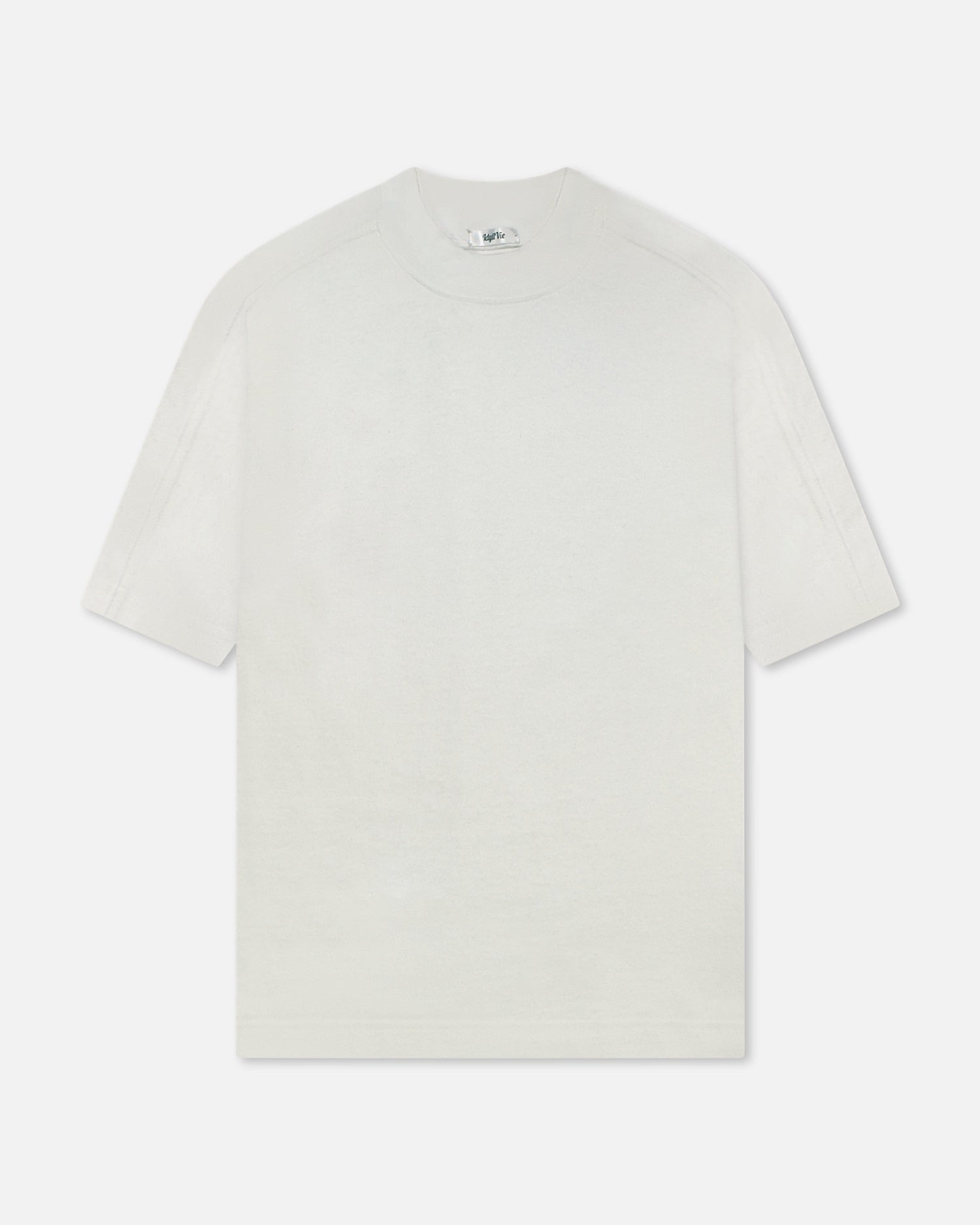 White oversized mock neck T-shirt with rib-knit collar and dropped shoulders, made from 100% cotton, 300 GSM fabric.