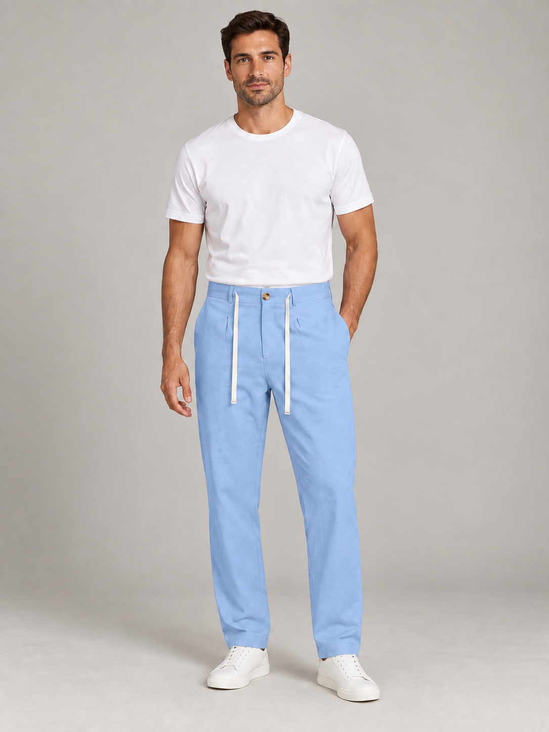 Baby Blue button-front drawstring trousers, model front.