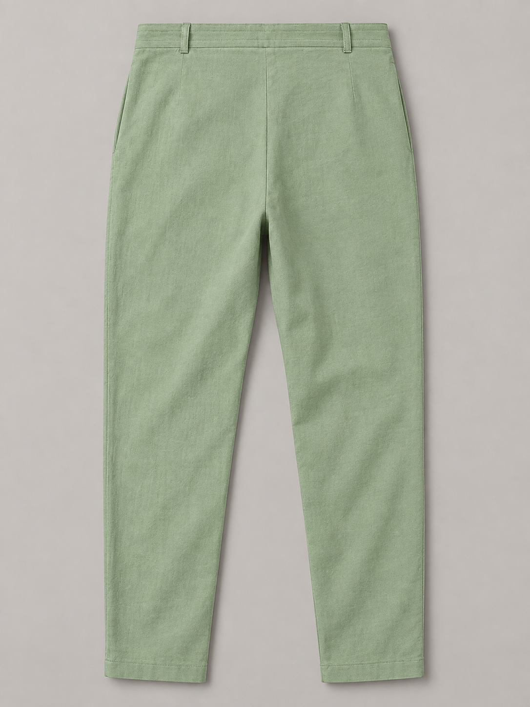 Green drawstring trousers, flat back with two belt loops and plain hems.