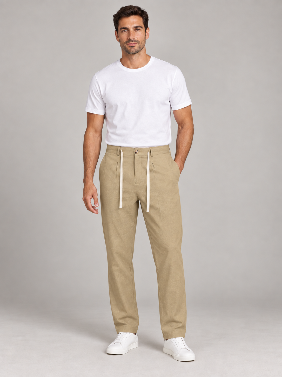 Khaki (Golden tone) button-front drawstring trousers, front view on a model.