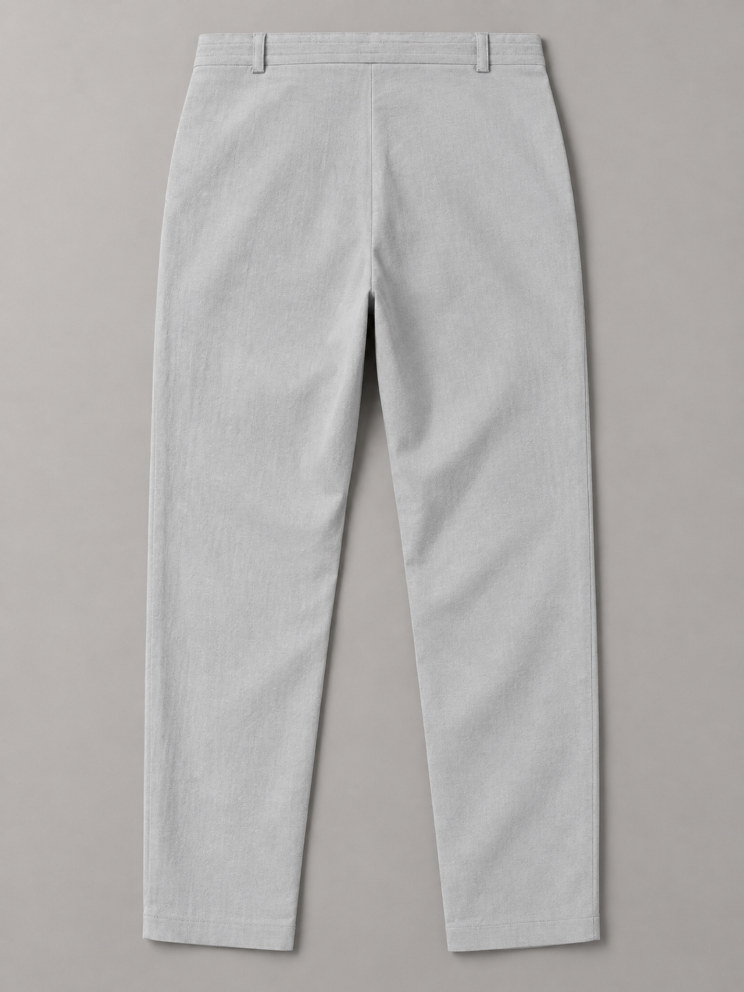 Light Grey drawstring trousers, flat back with two belt loops and plain hems.