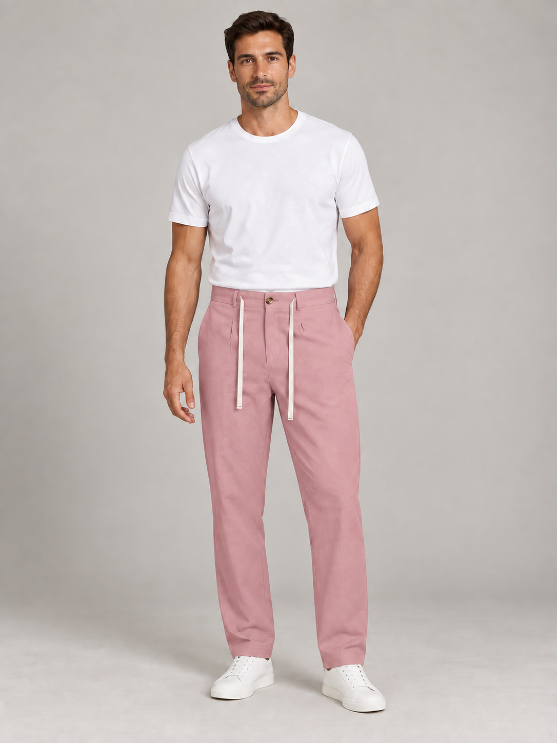 Pink button-front drawstring trousers, model front.