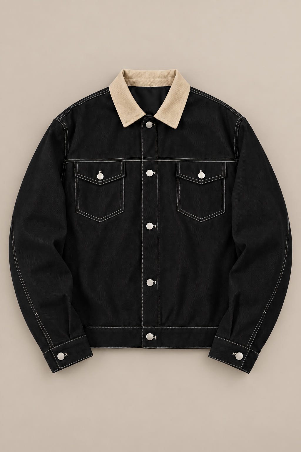 Black cotton jacket with beige collar, flat front showing flap chest pockets and contrast stitching.