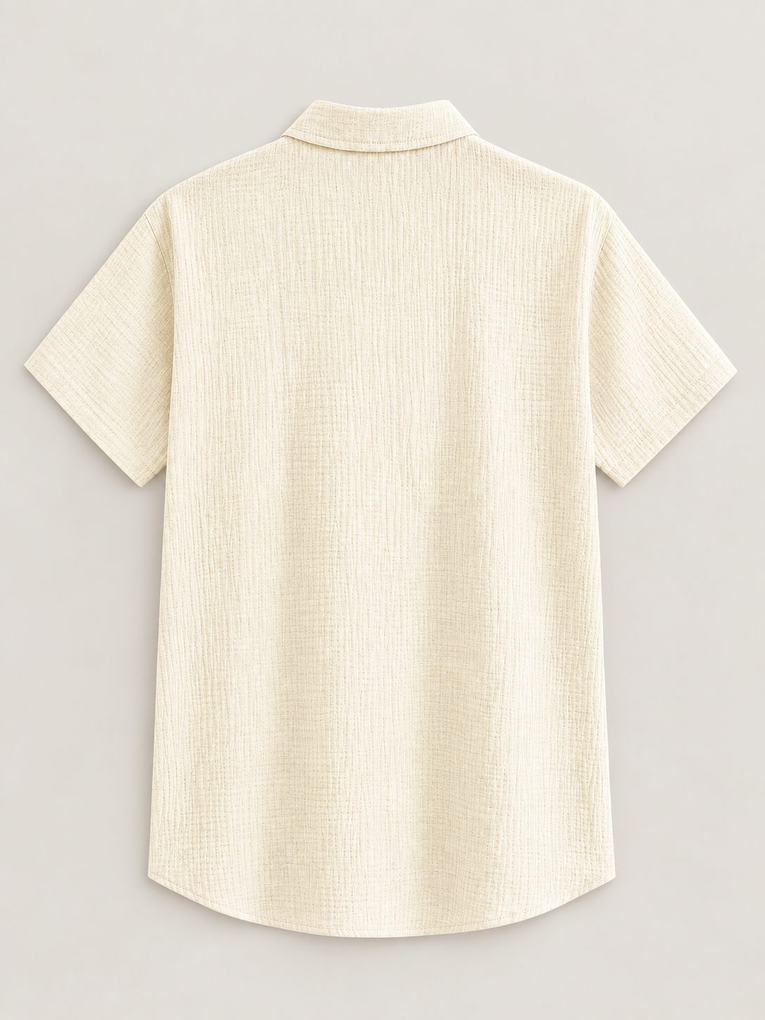 Pale khaki textured cotton short-sleeve shirt, flat lay back.