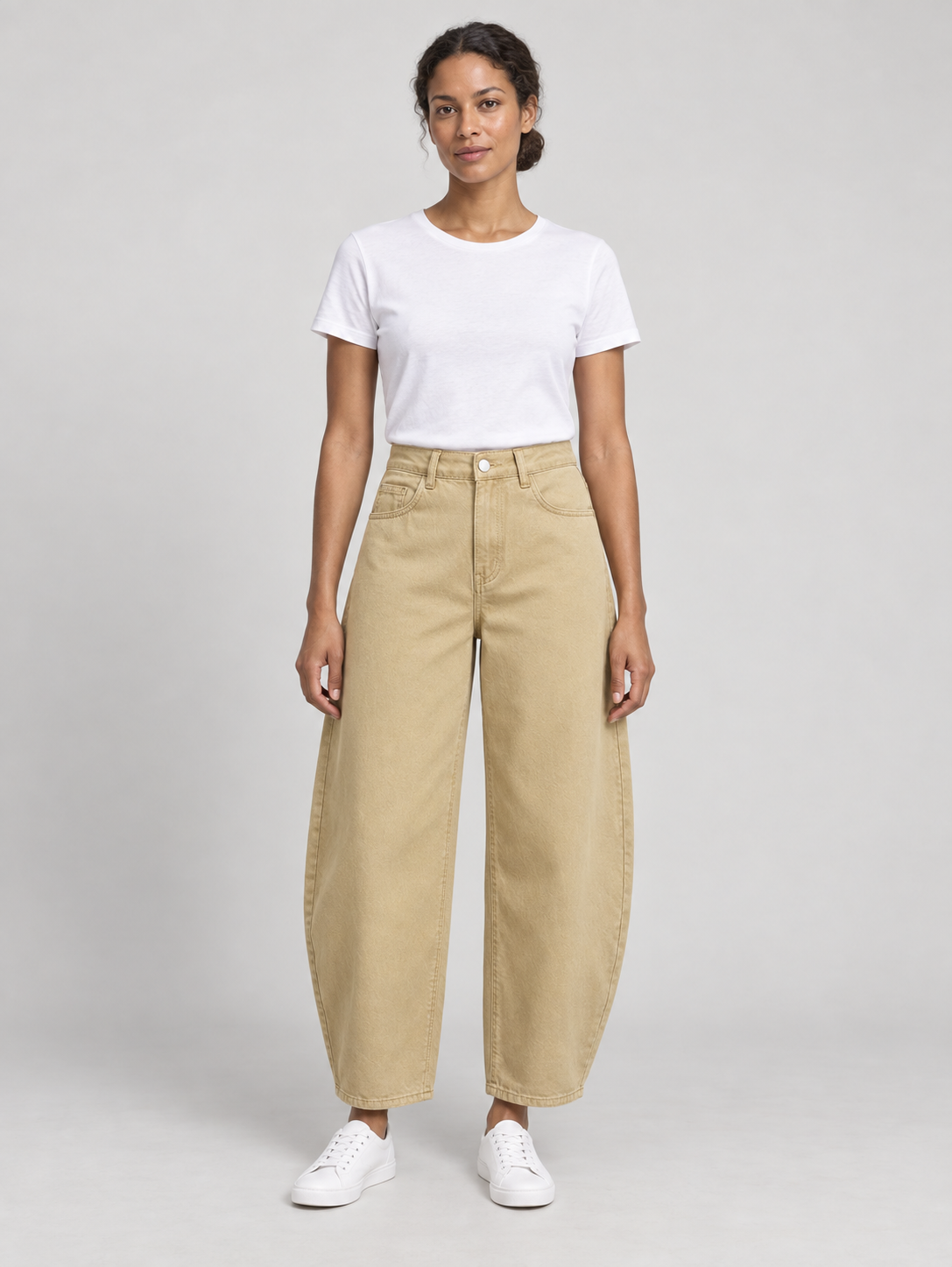 Khaki cotton barrel-leg jeans, front view on a model.