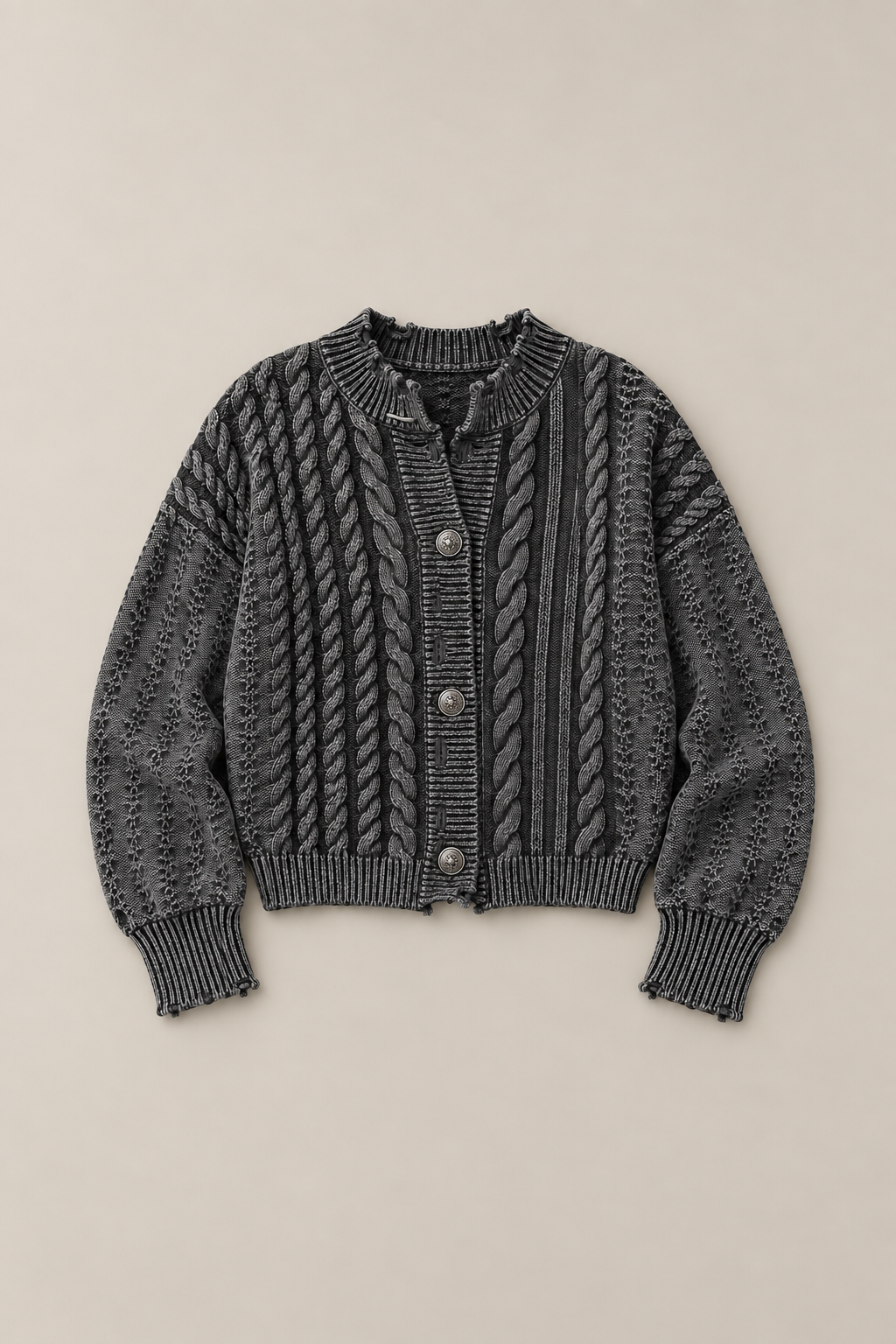 Grey three-button drop-shoulder cardigan, flat front showing cable-knit panels and ribbed cuffs.
