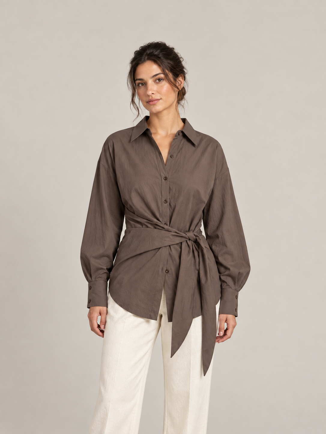 Brown cotton tie-waist shirt, model front.