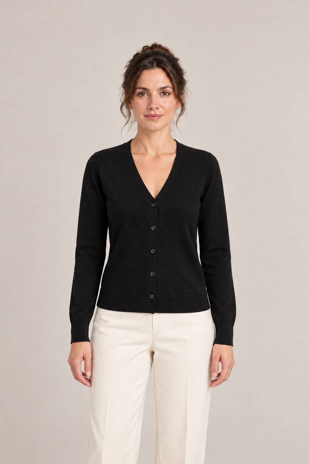 Front view of a black V-neck cardigan with five buttons and ribbed cuffs and hem.