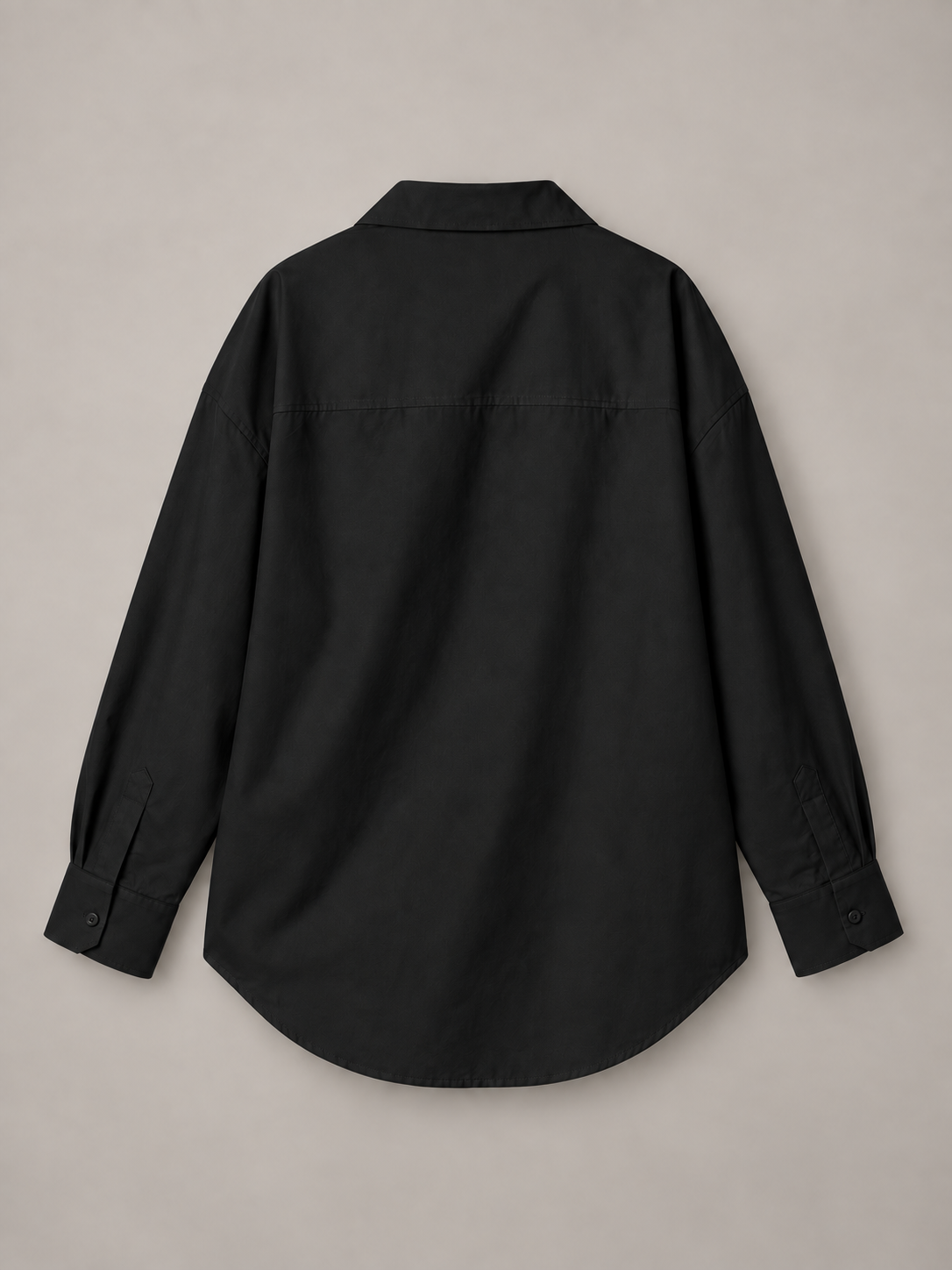 Black oversized button-up shirt, flat back showing the horizontal shoulder yoke.