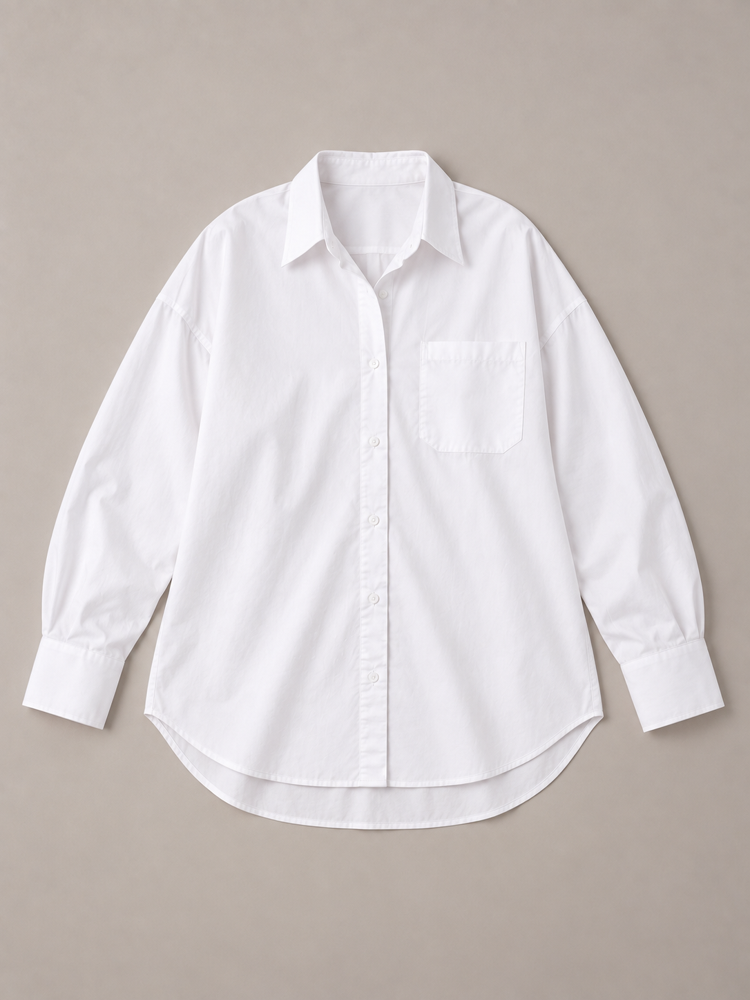 White oversized button-up shirt, flat lay front