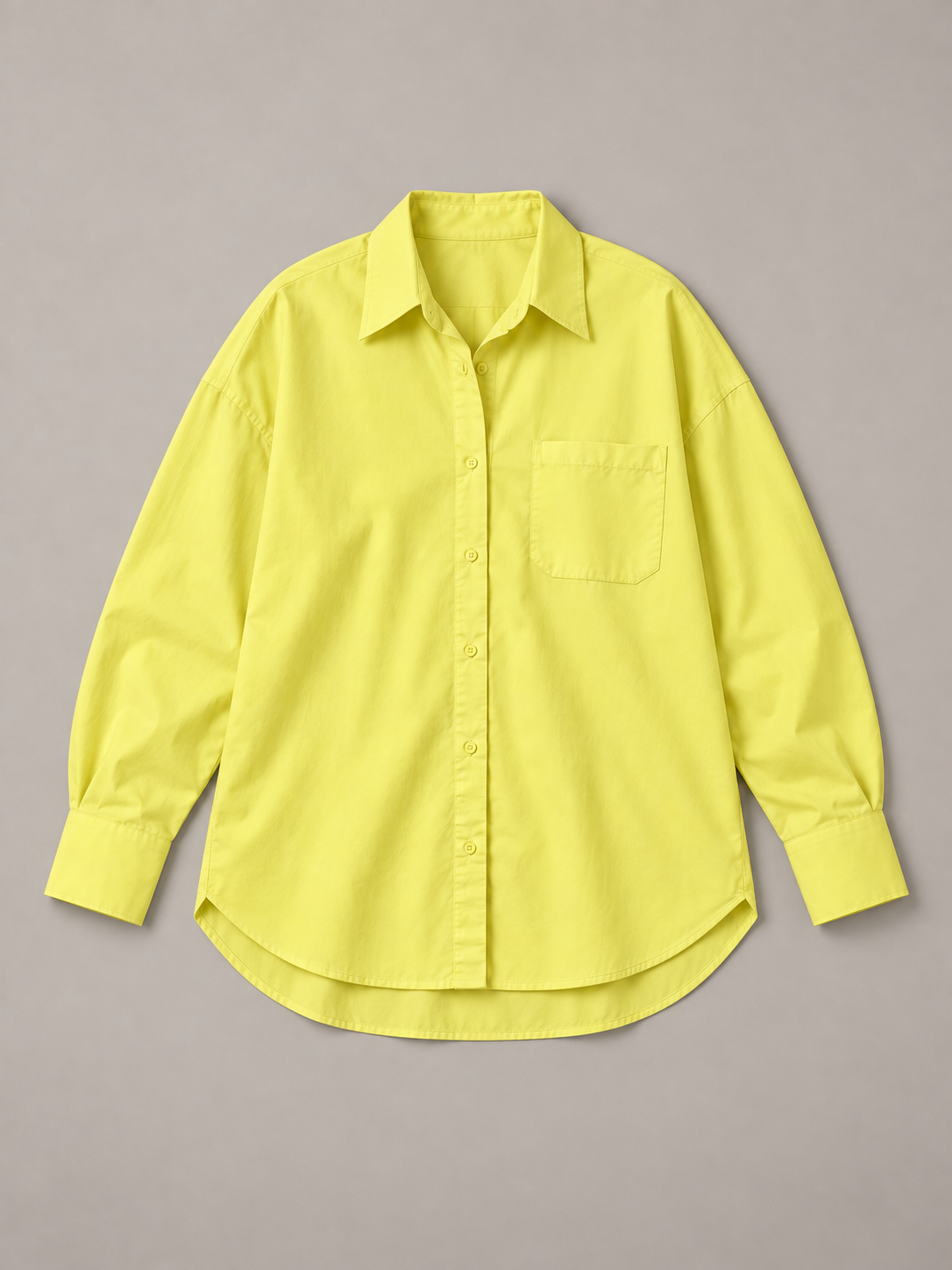 Yellow oversized button-up shirt, flat lay front