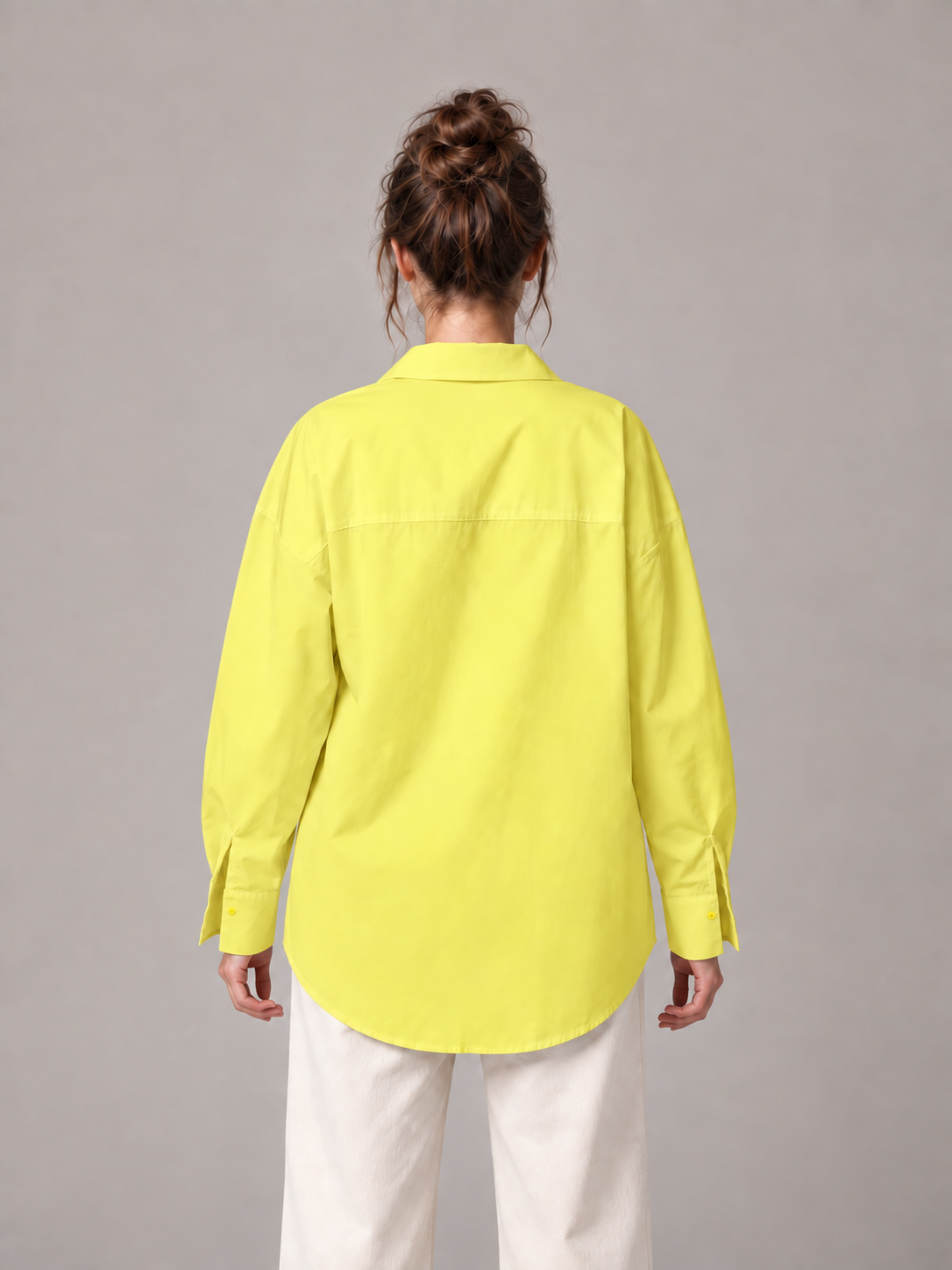 Yellow oversized button-up shirt, model back