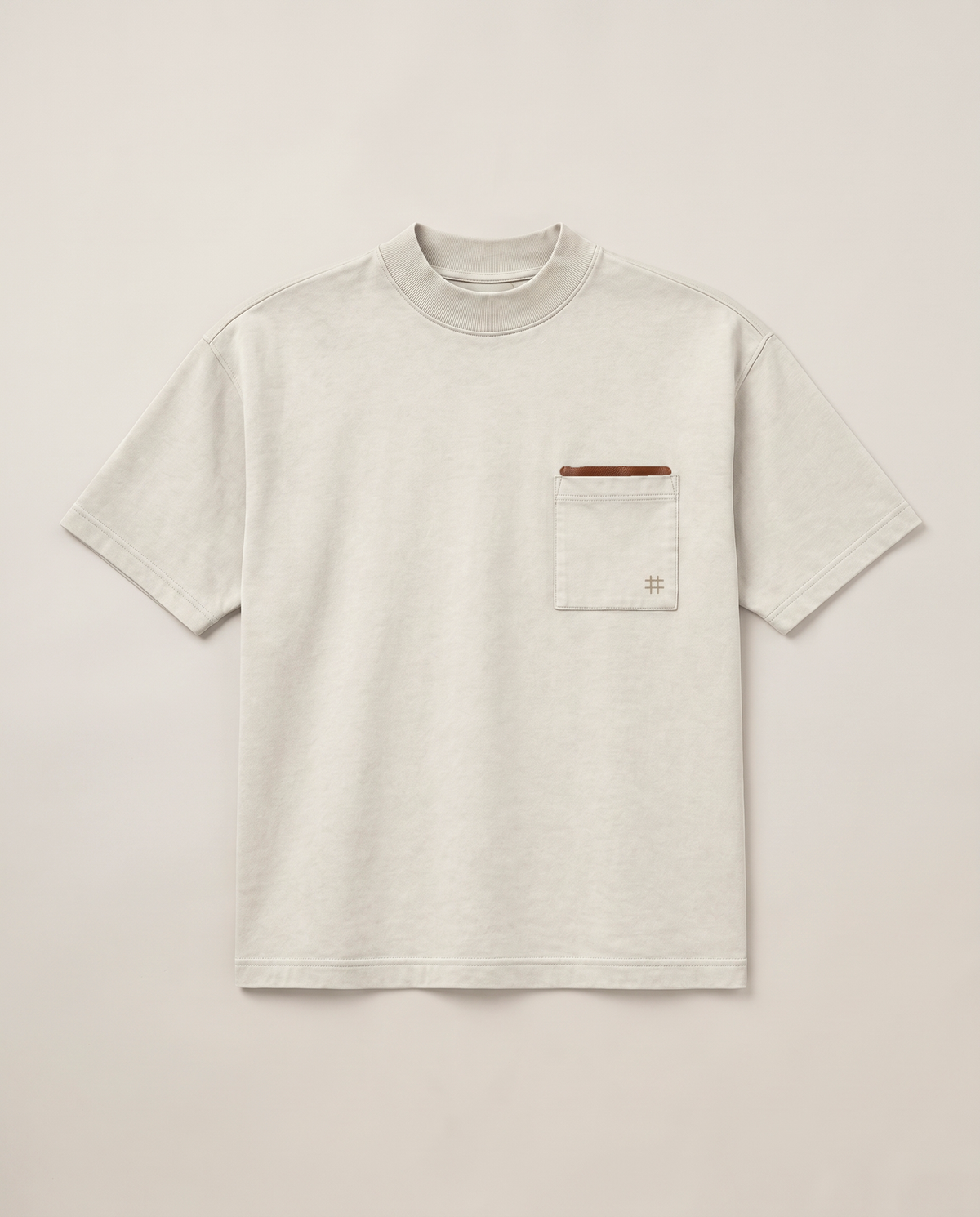 Field Note T-shirt flat lay front in washed chalk with rib mock neck and wearer-left patch pocket