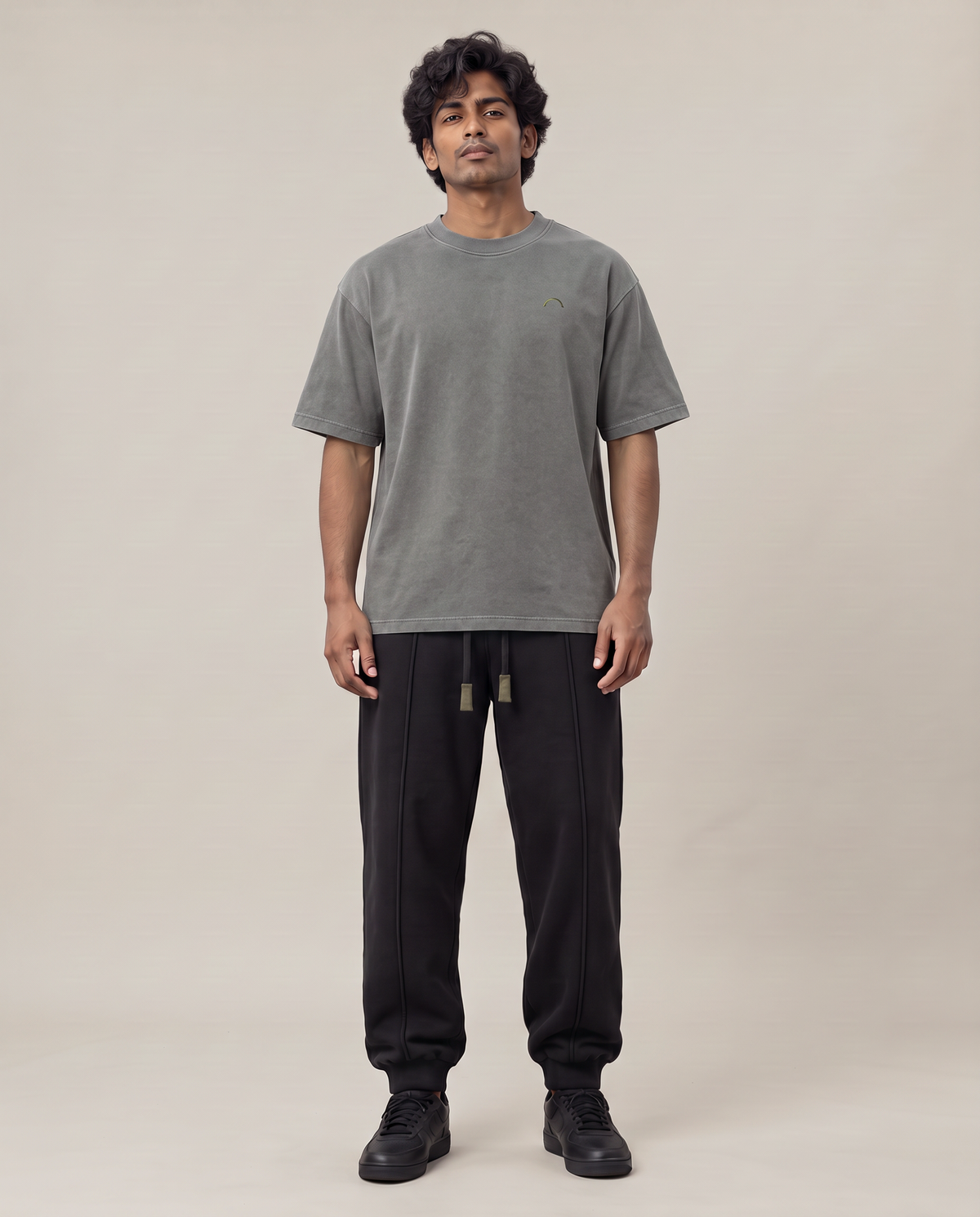 Quiet Arc T-shirt front on model in washed graphite