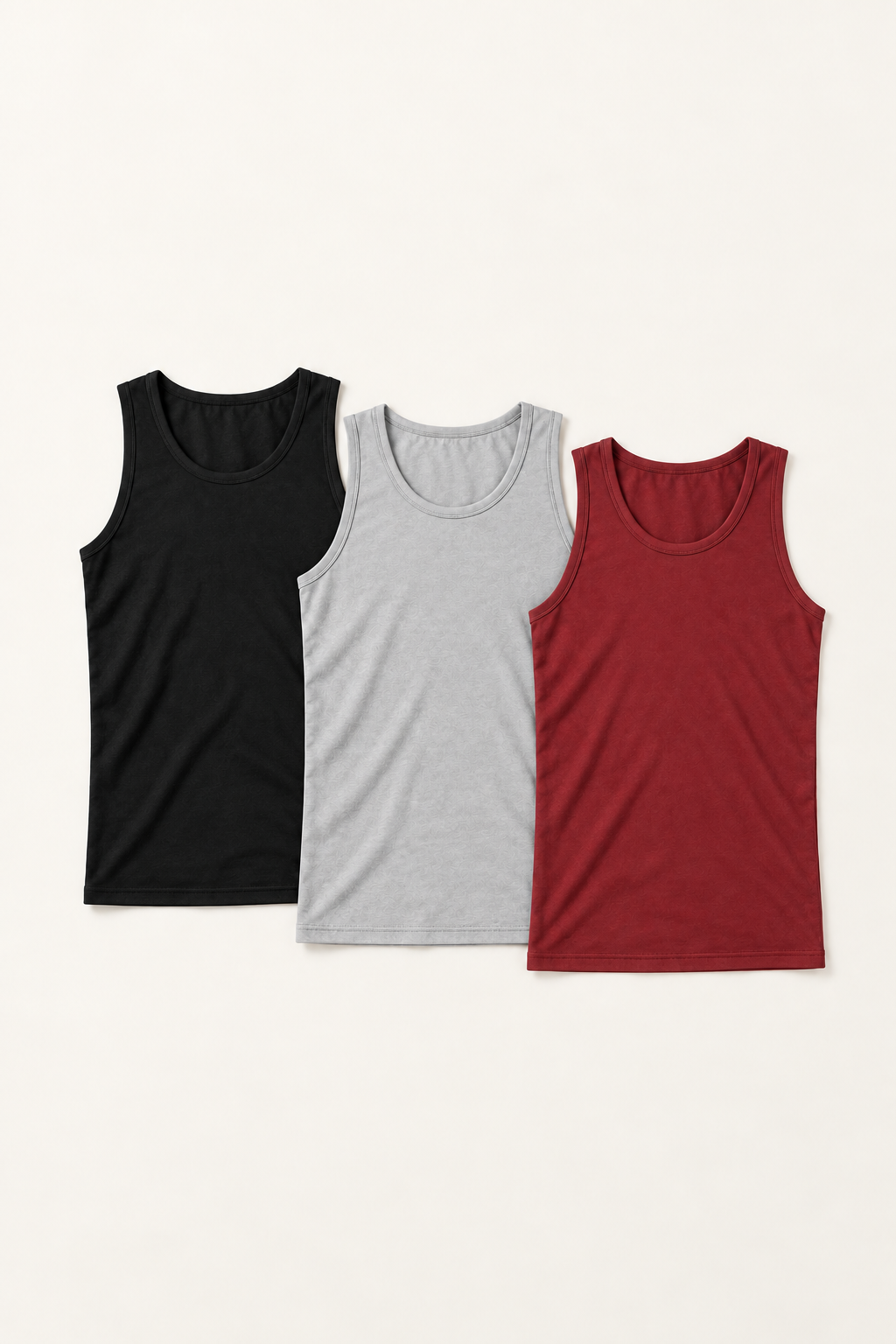 Three cotton-stretch racerback tanks in black / light grey / burgundy, front flat lay.
