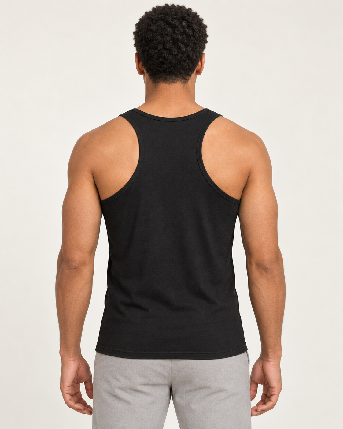 Black cotton-stretch racerback tank, on-model back view.