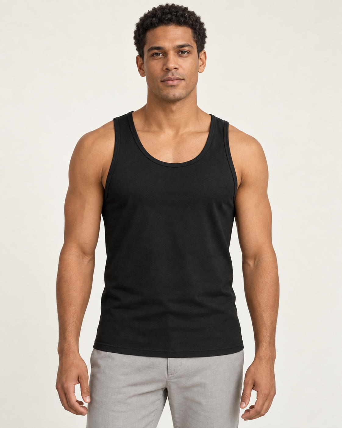 Black cotton-stretch racerback tank, on-model front view.