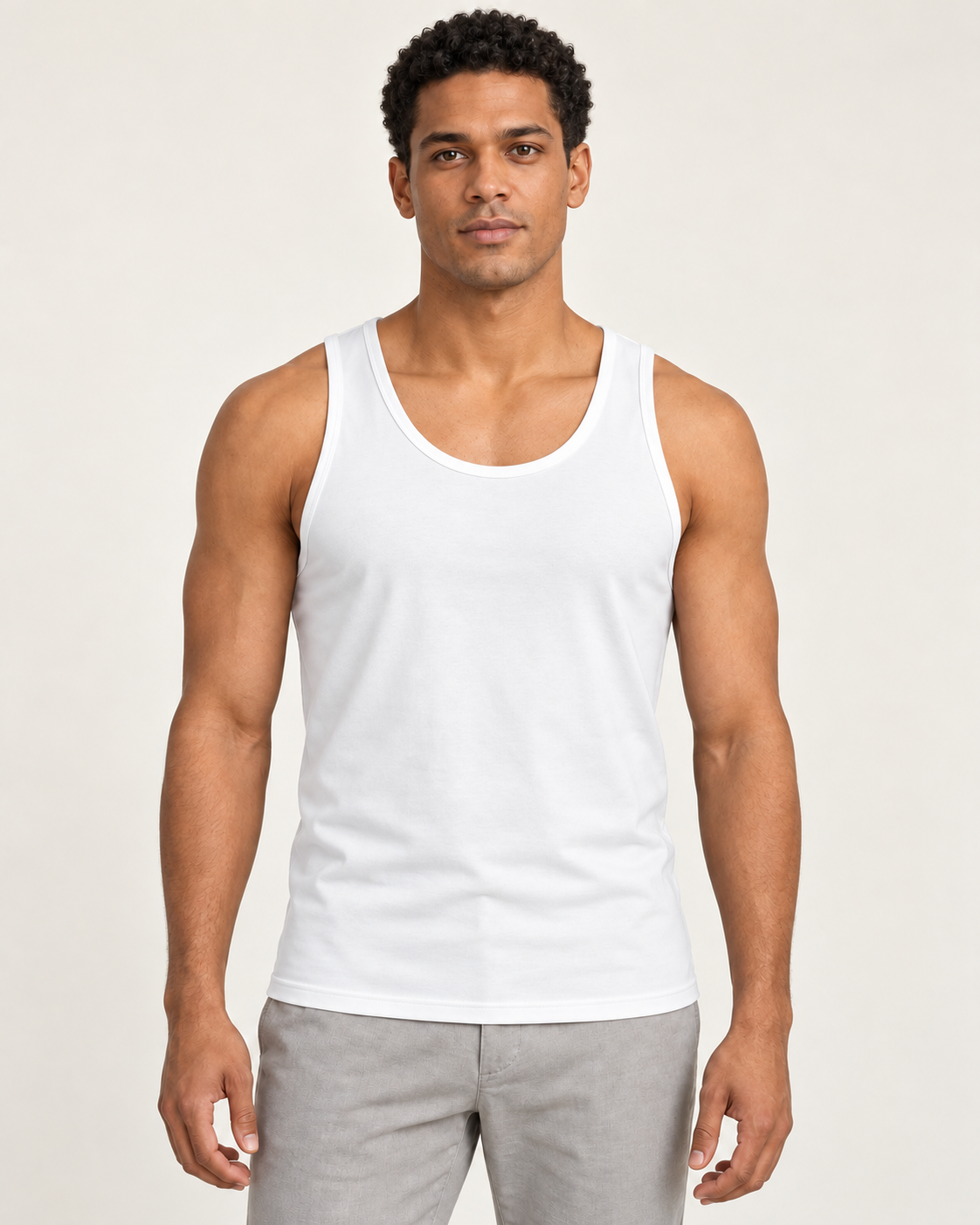 White cotton-stretch racerback tank, on-model front view.