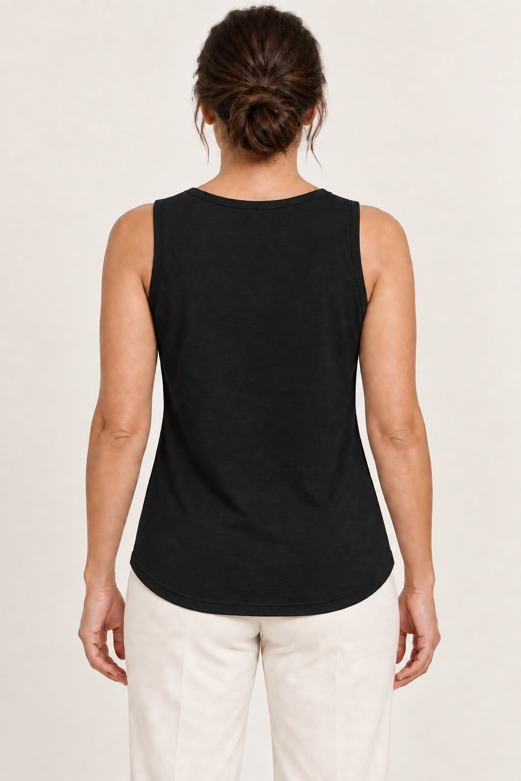 Black cotton-stretch round-neck tank, model back.
