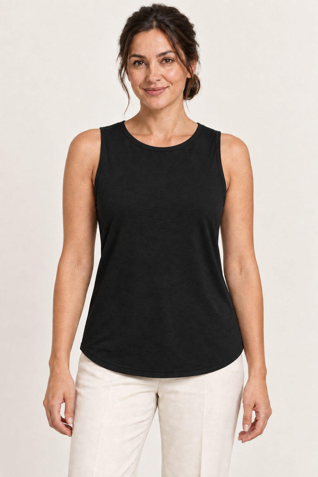 Black cotton-stretch round-neck tank, model front.