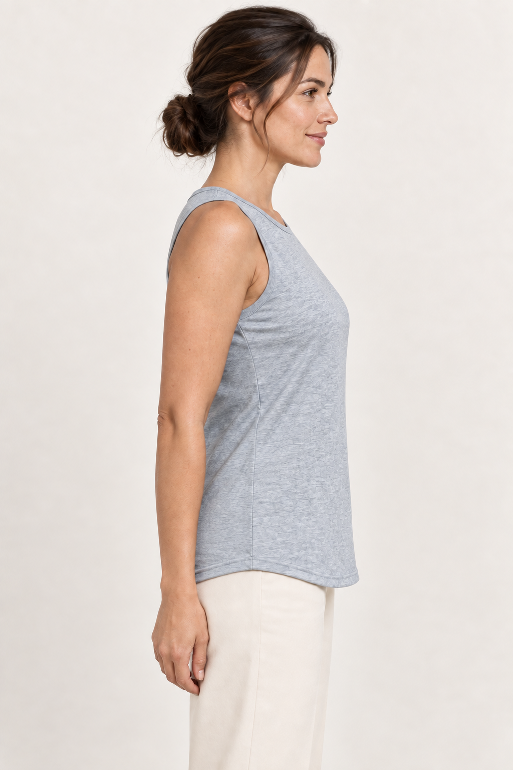 Light grey cotton-stretch round-neck tank, model side.
