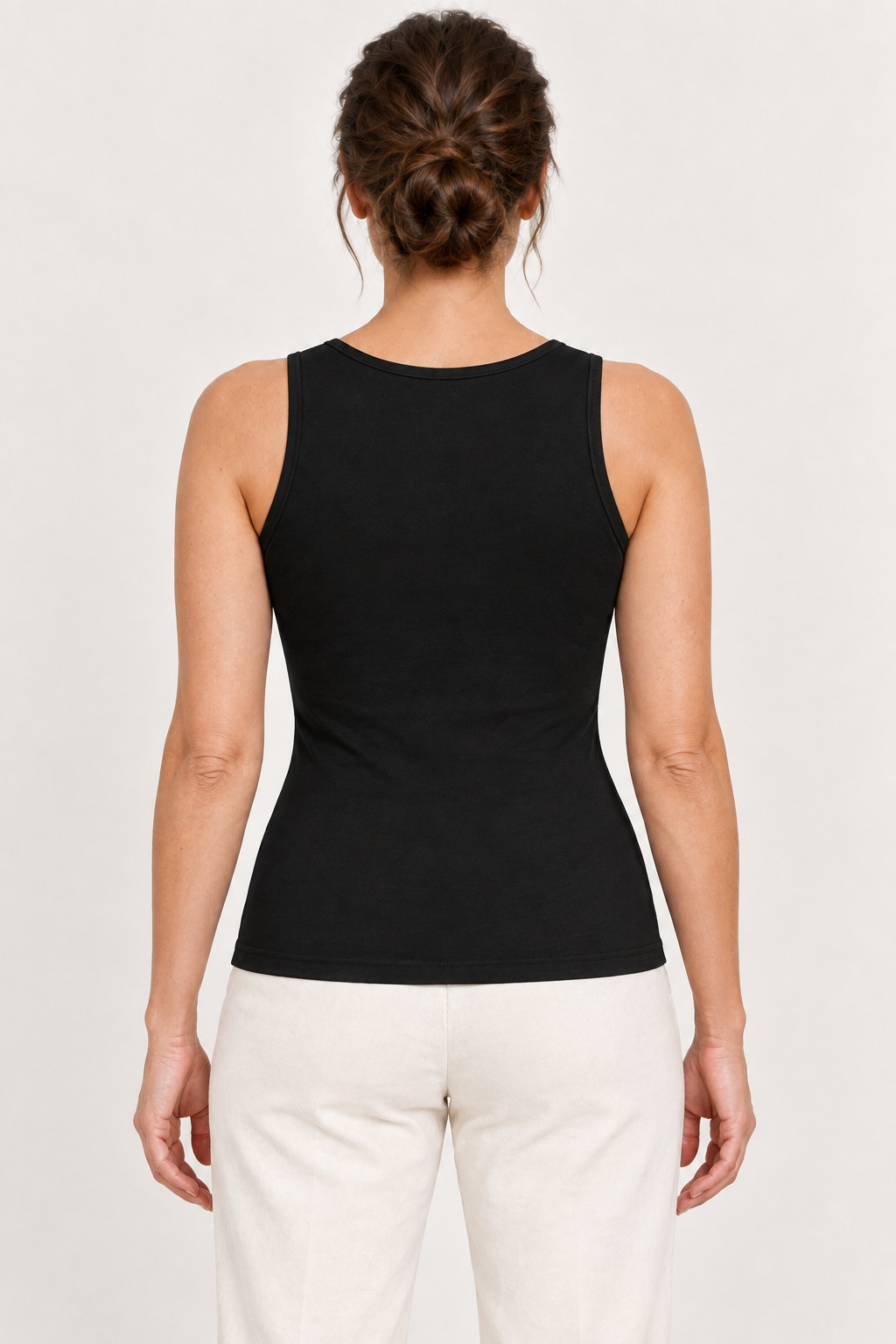 Black cotton-stretch scoop-neck tank, model back.
