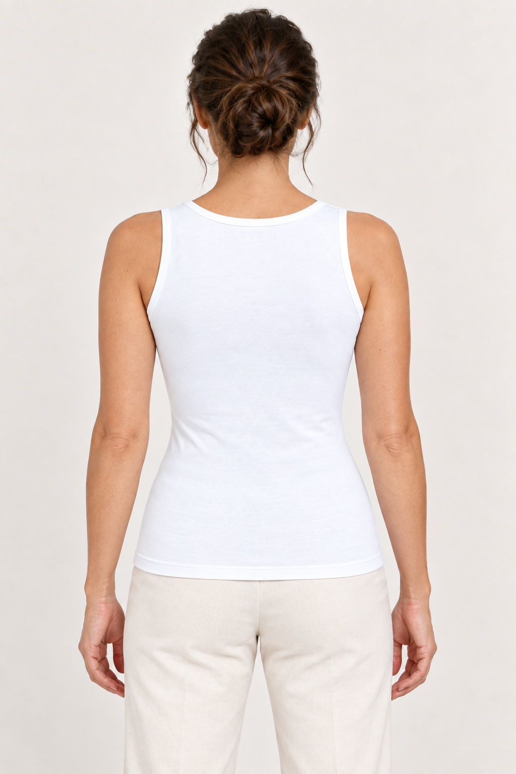 White cotton-stretch scoop-neck tank, model back.
