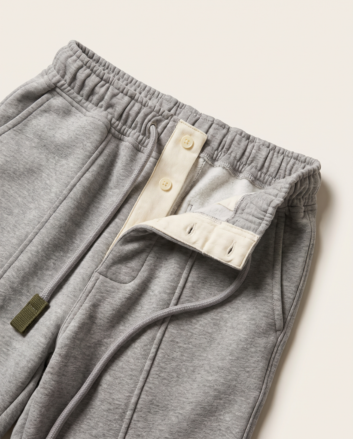 Mercer Pleated Sweatpants — Heather Grey waistband and fly close-up