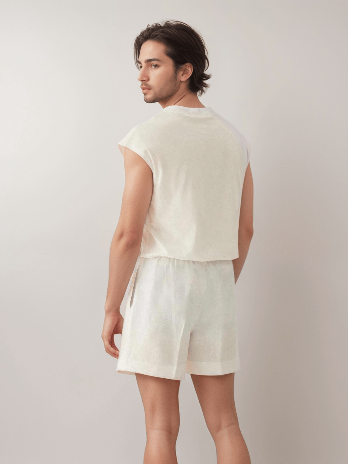 Back view of Men's White Linen Shorts highlighting elastic waistband and relaxed fit, perfect for stylish and breathable summer outfits.