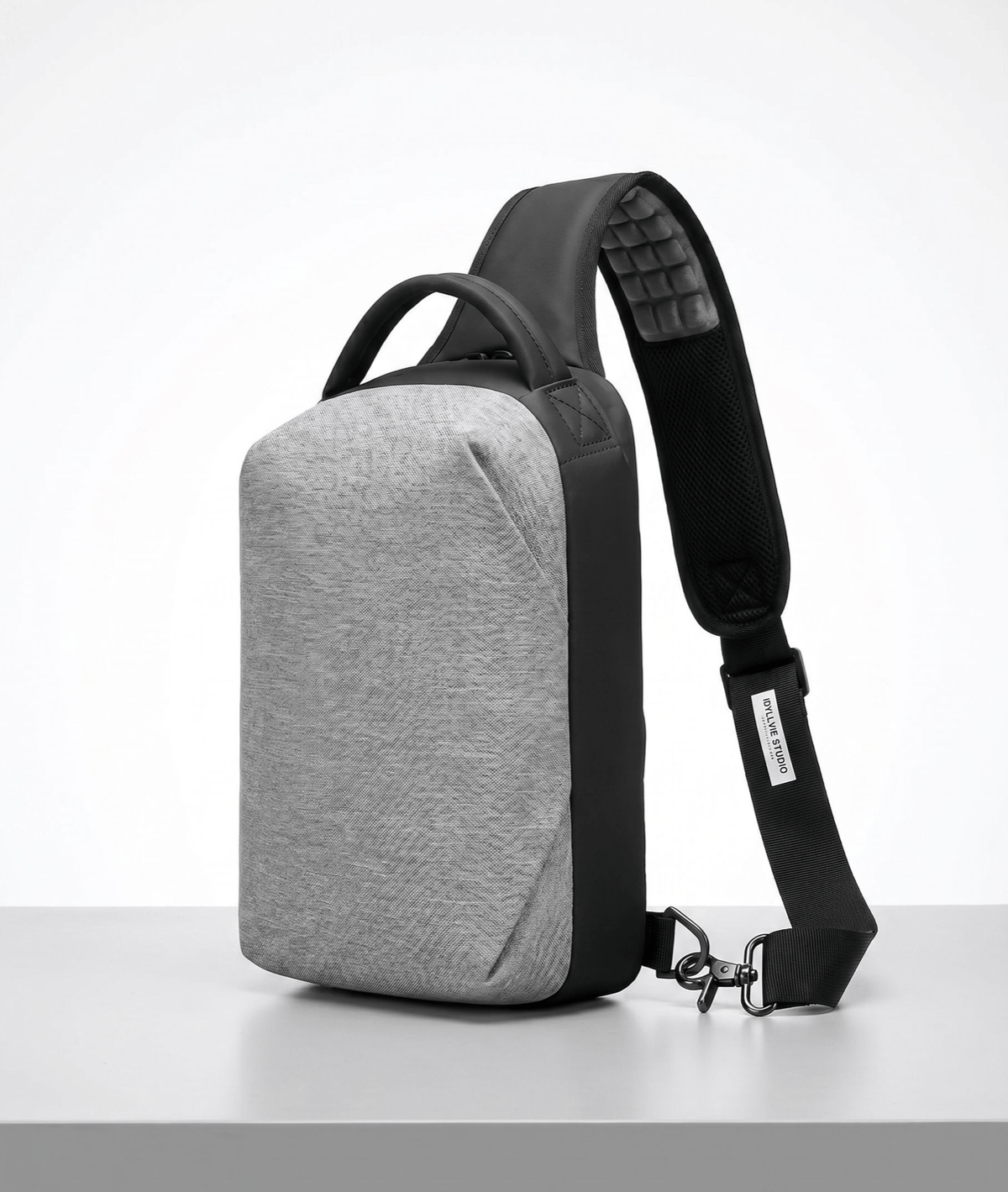 IdyllVie grey and black Oxford fabric sling bag with padded crossbody strap