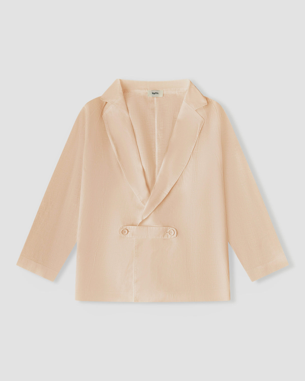 Oversized Linen Blazer in white 100% linen, lifestyle view showing product details