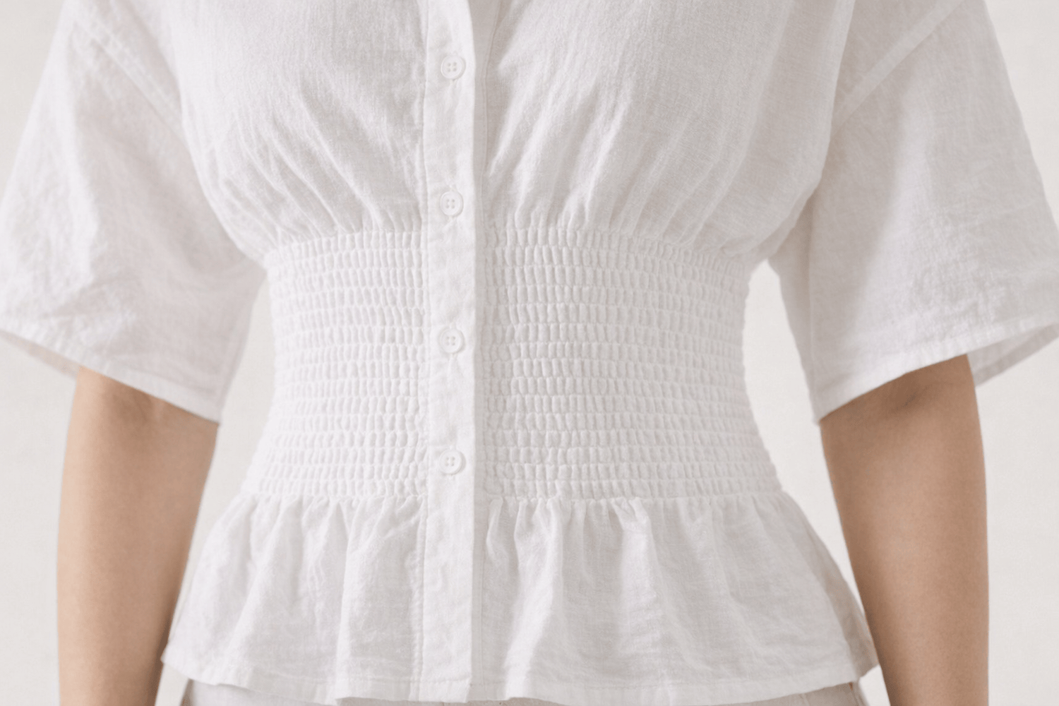 IdyllVie Cotton Batwing Sleeve Shirt in White shirt detail close-up with refined IdyllVie styling