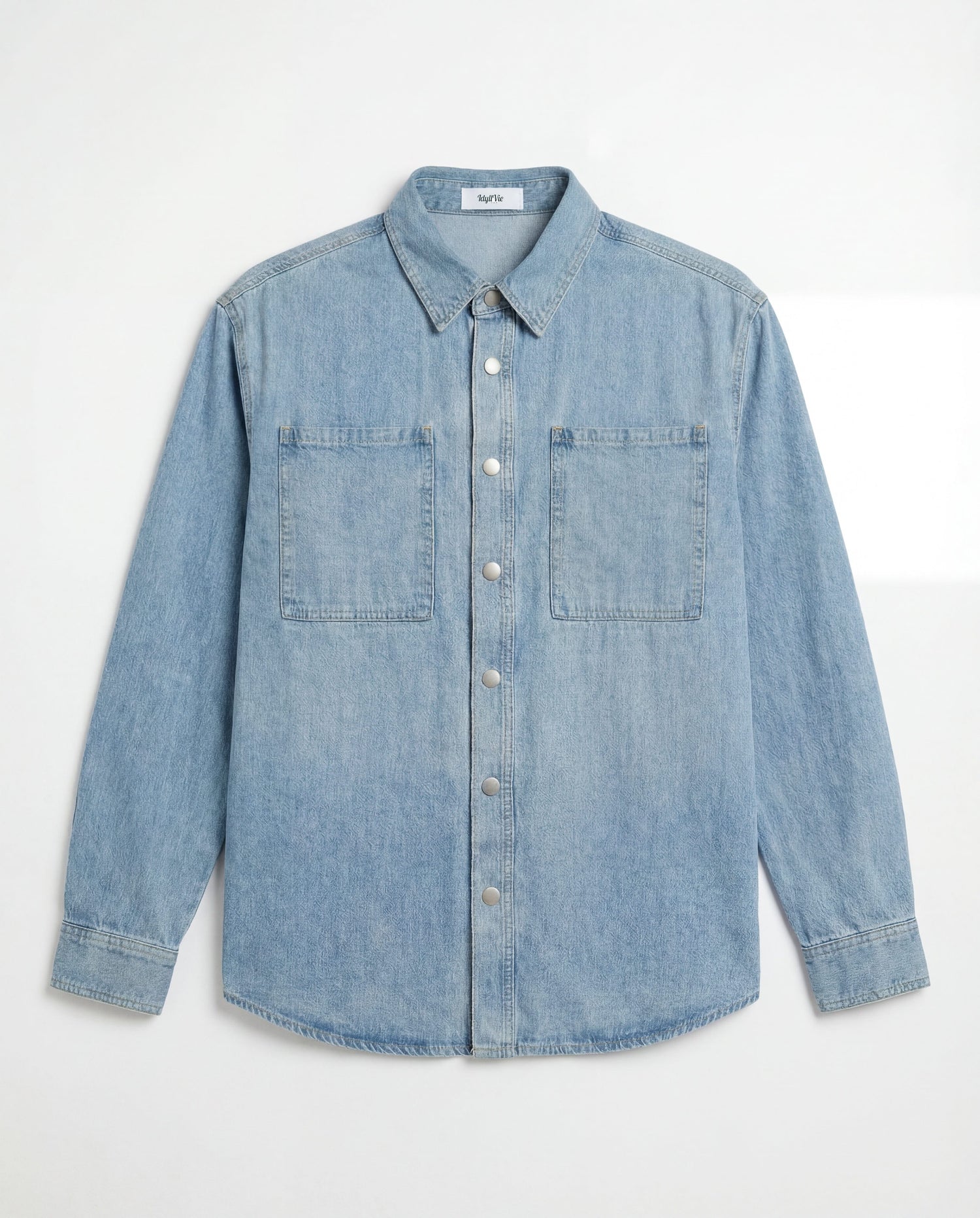 Light blue denim long sleeve overshirt with chest pockets and metal buttons