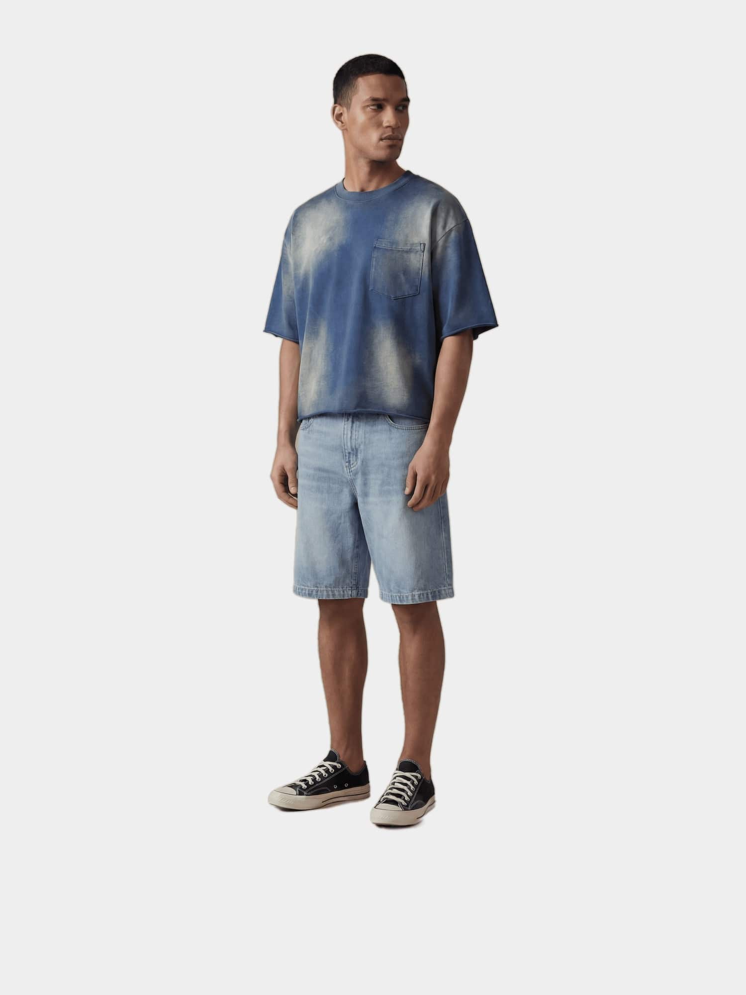 Stonewashed Denim Bermuda Shorts in stonewashed cotton, lifestyle view showing front pockets