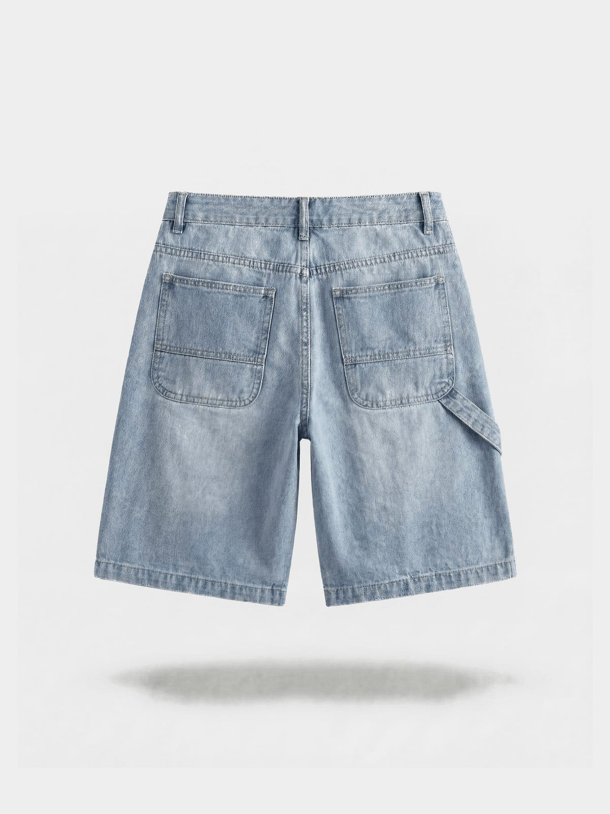 Stonewashed Denim Bermuda Shorts in stonewashed cotton, lifestyle view showing front pockets