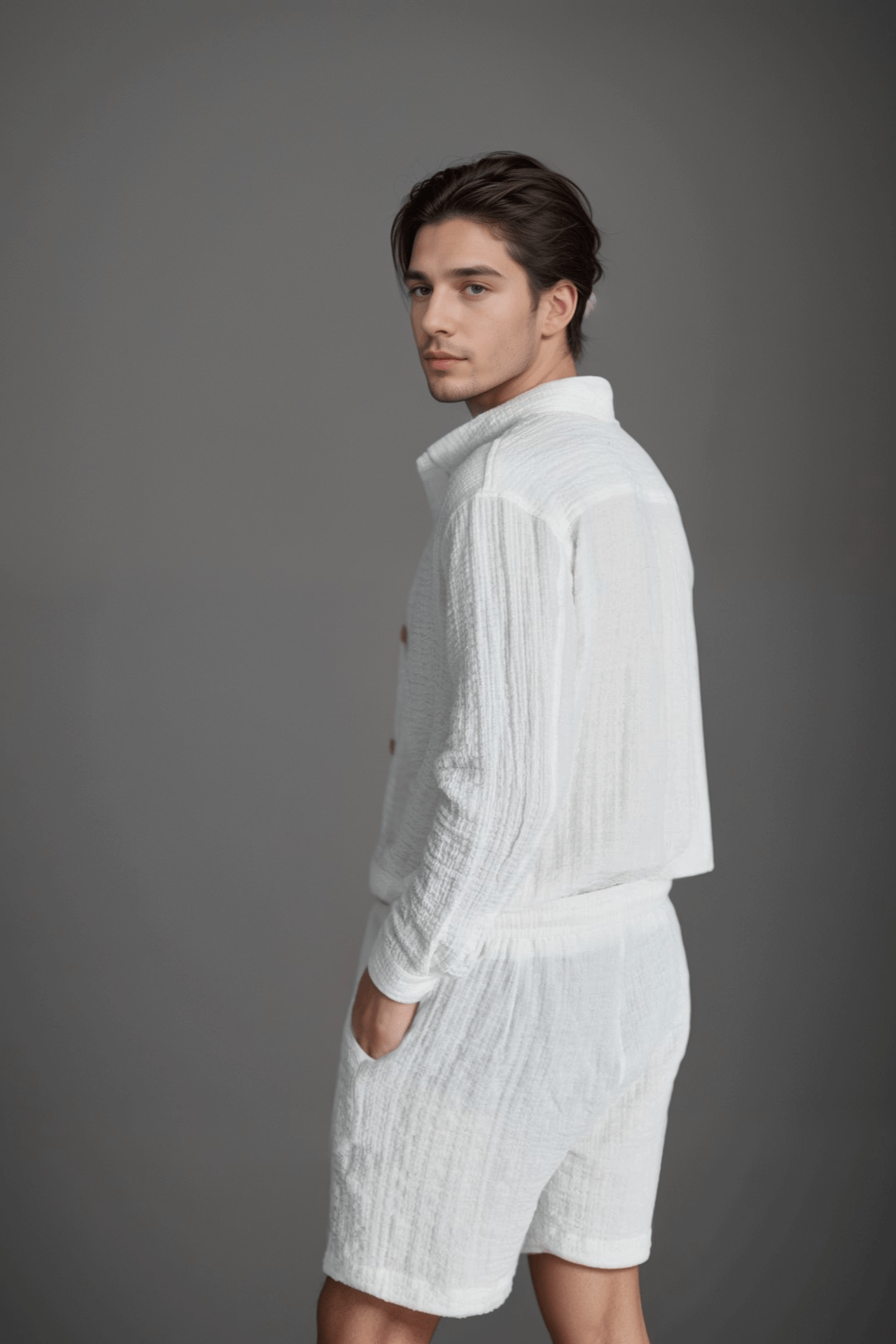 The Porterville Shorts in white 100% cotton muslin, detail product view showing drawstring waist, front pockets, cotton muslin texture