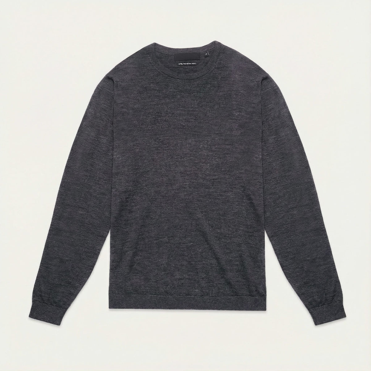 Merino Wool Crew Neck Sweater in charcoal merino wool, lifestyle view showing crew neck fit and everyday styling