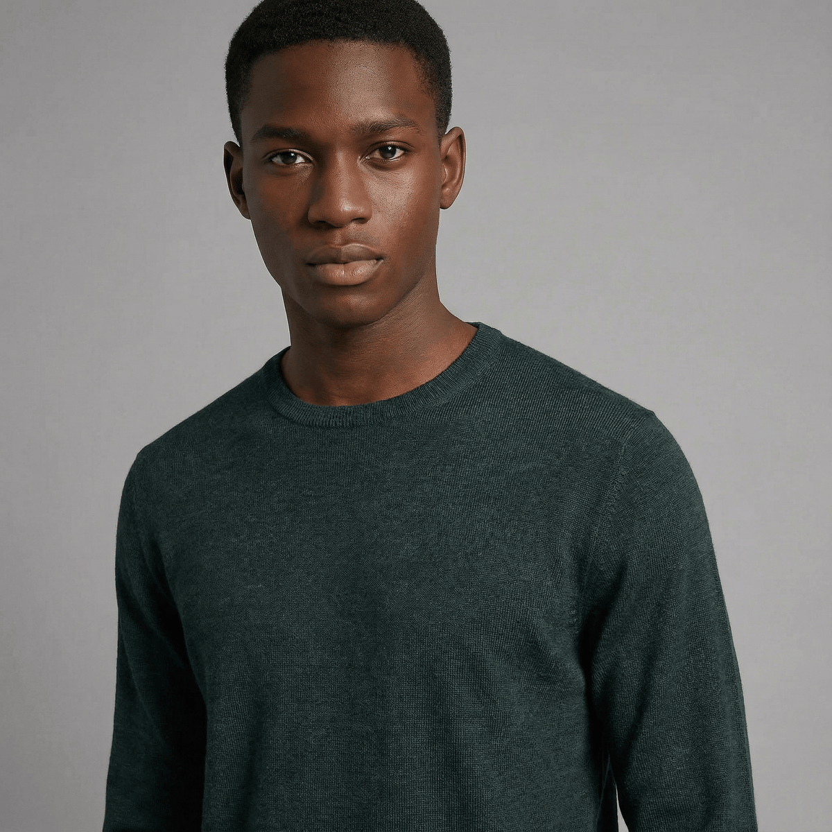 Merino Wool Crew Neck Sweater in burgundy merino wool, front product view showing crew neck fit and everyday styling