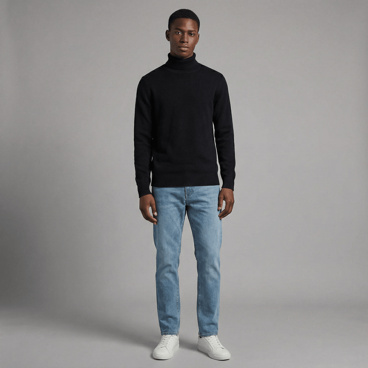 Merino Wool Sport Turtleneck in black merino wool, angled product view showing product details