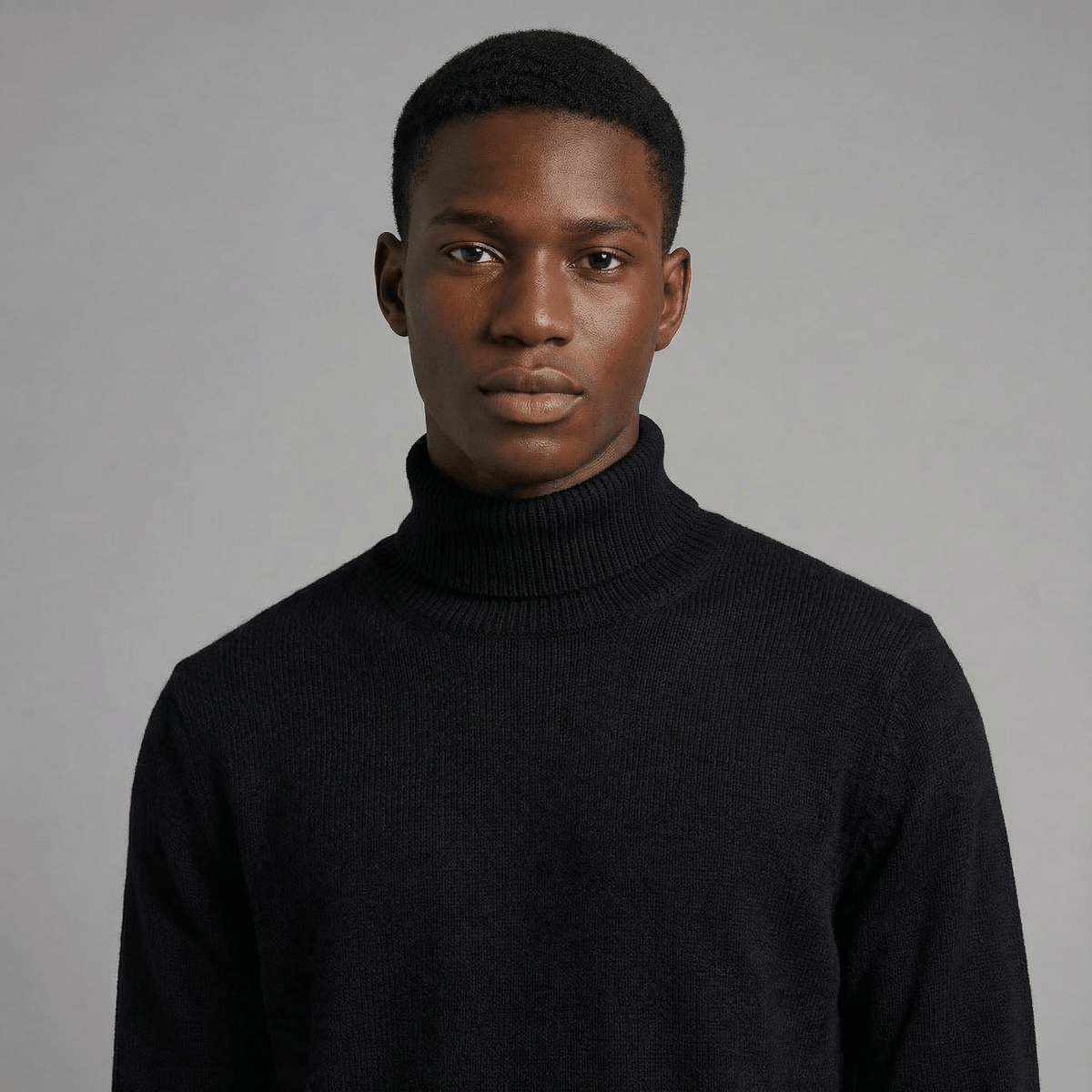 Merino Wool Sport Turtleneck in black merino wool, detail product view showing product details