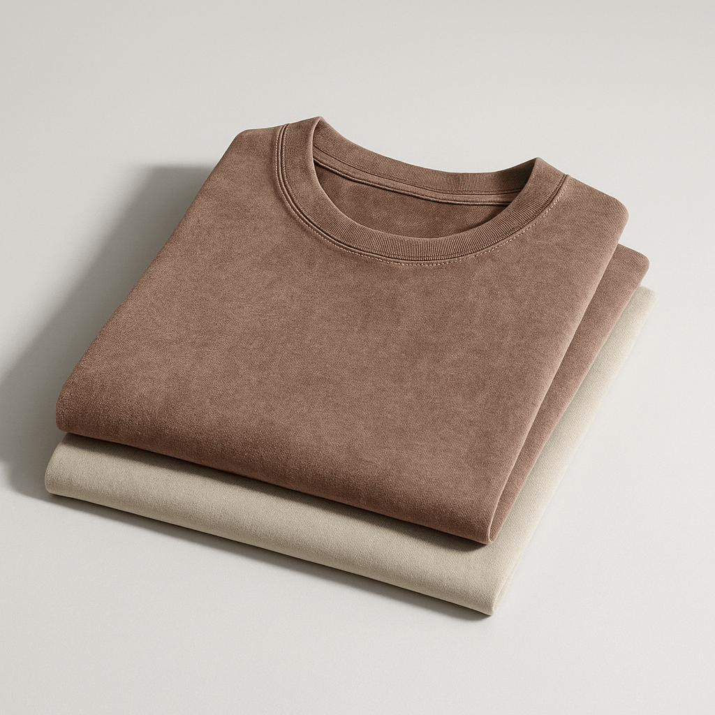Stacked men's organic cotton T-shirts in beige and brown